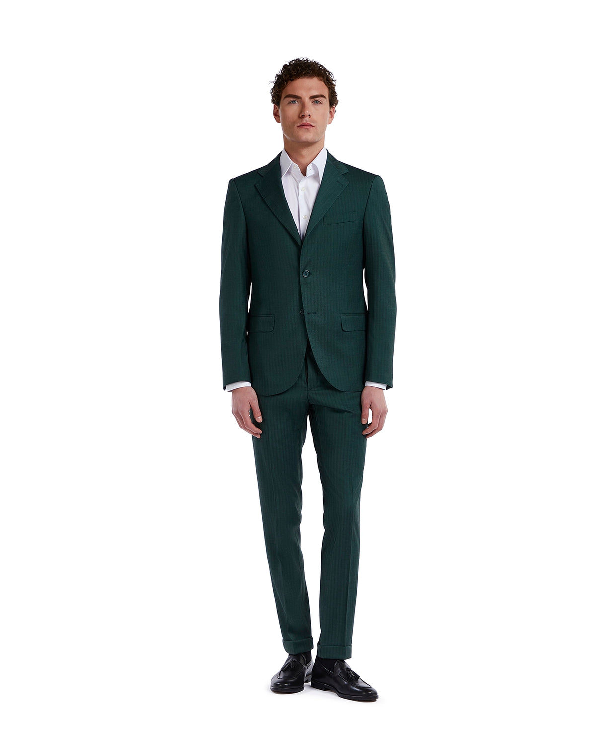 Men's green patterned suit, tailored fit, made of lightweight fabric, paired with a white shirt and black dress shoes.