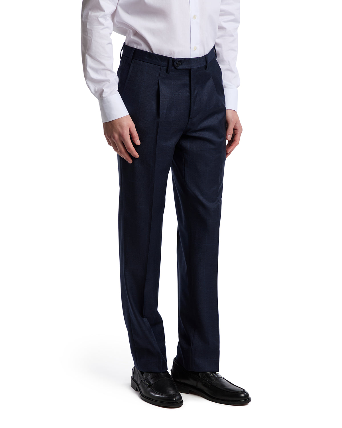 Men's navy blue pleated dress pants in lightweight fabric, perfect for formal occasions. Paired with a classic white shirt.