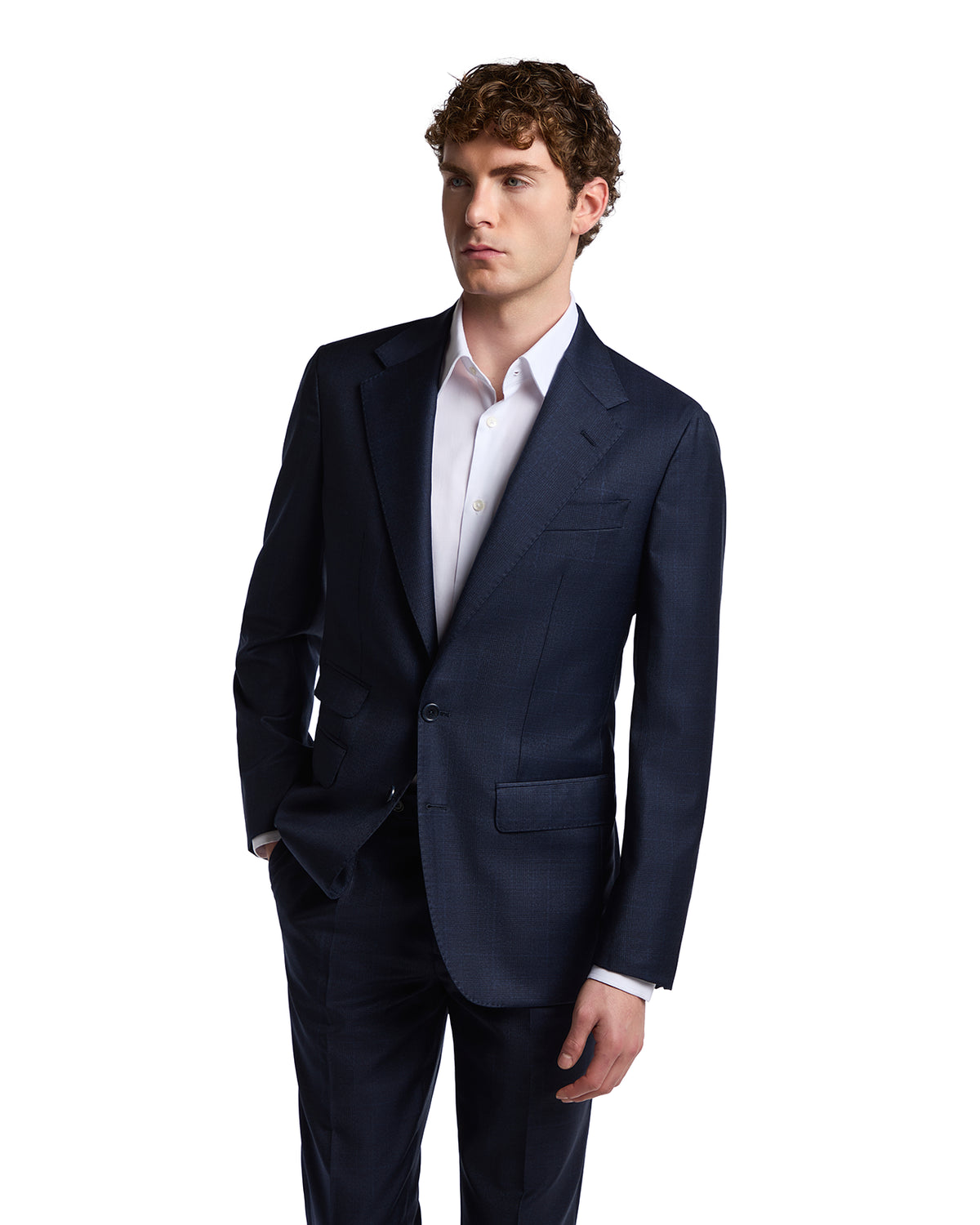 Navy blue tailored suit jacket in lightweight fabric, paired with a sleek white dress shirt for a sophisticated look.