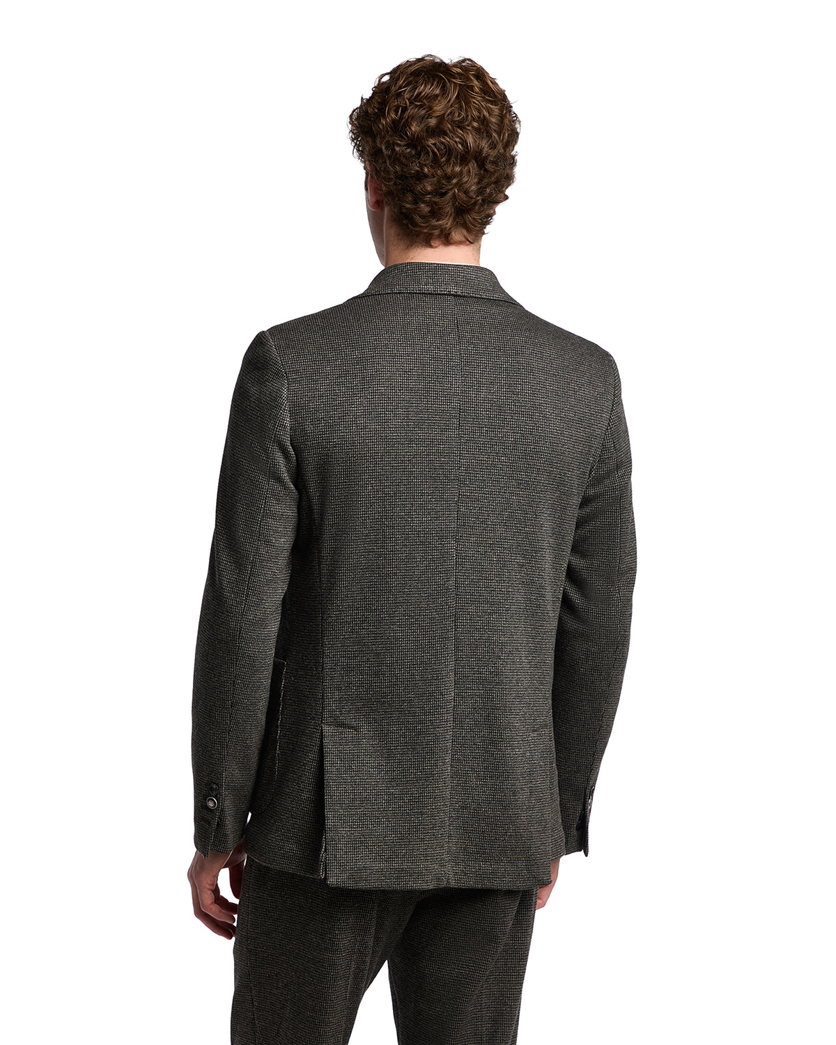 Men's charcoal grey tailored blazer, made of wool blend fabric, featuring a single vent and sleek design.