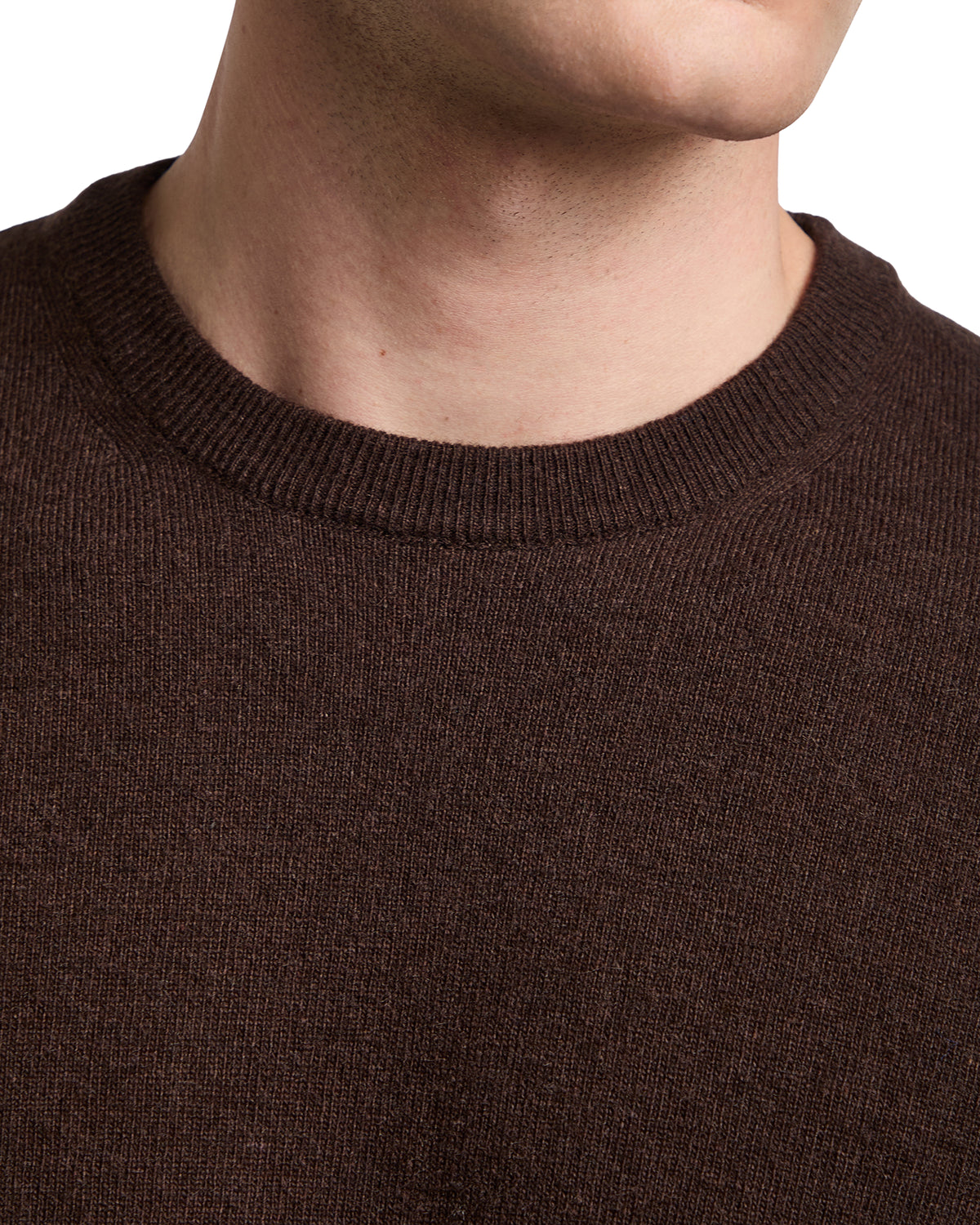 Men's brown knit sweater with a crew neckline, crafted from soft, breathable fabric for casual comfort.