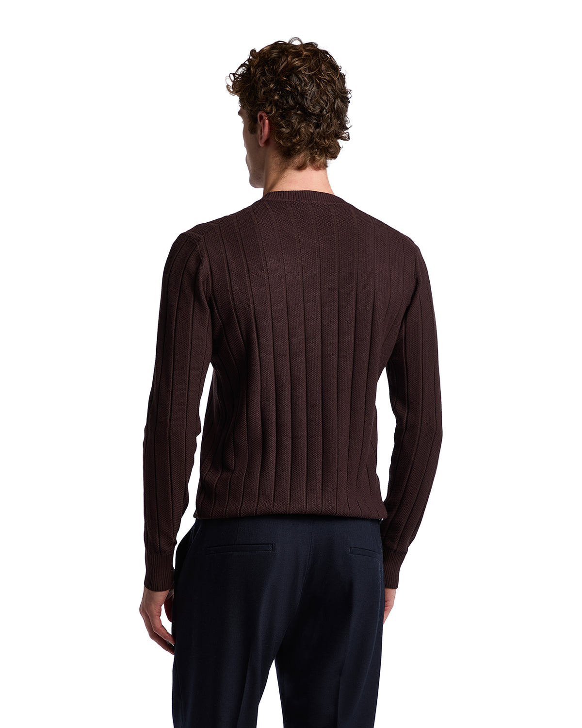 Men's brown ribbed knit sweater, made from soft fabric, featuring long sleeves and a crew neck, styled for a modern look.