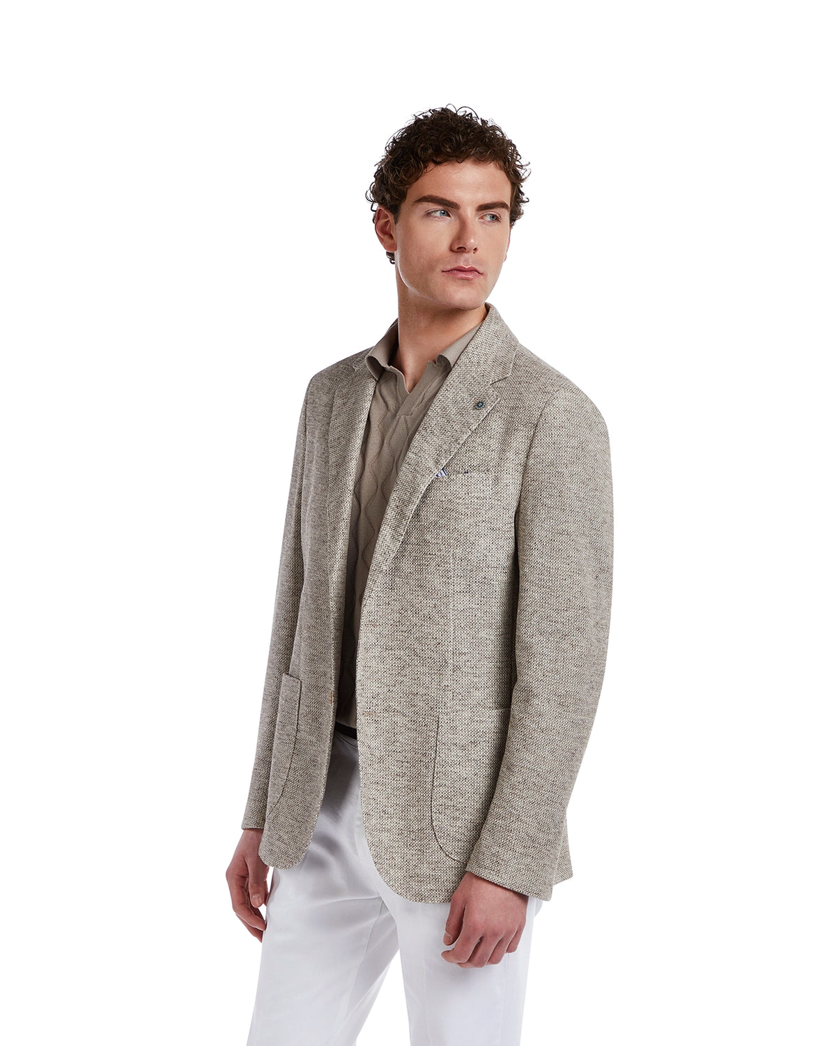 Men's light gray textured blazer in breathable fabric, paired with a beige shirt and white pants for a sophisticated look.