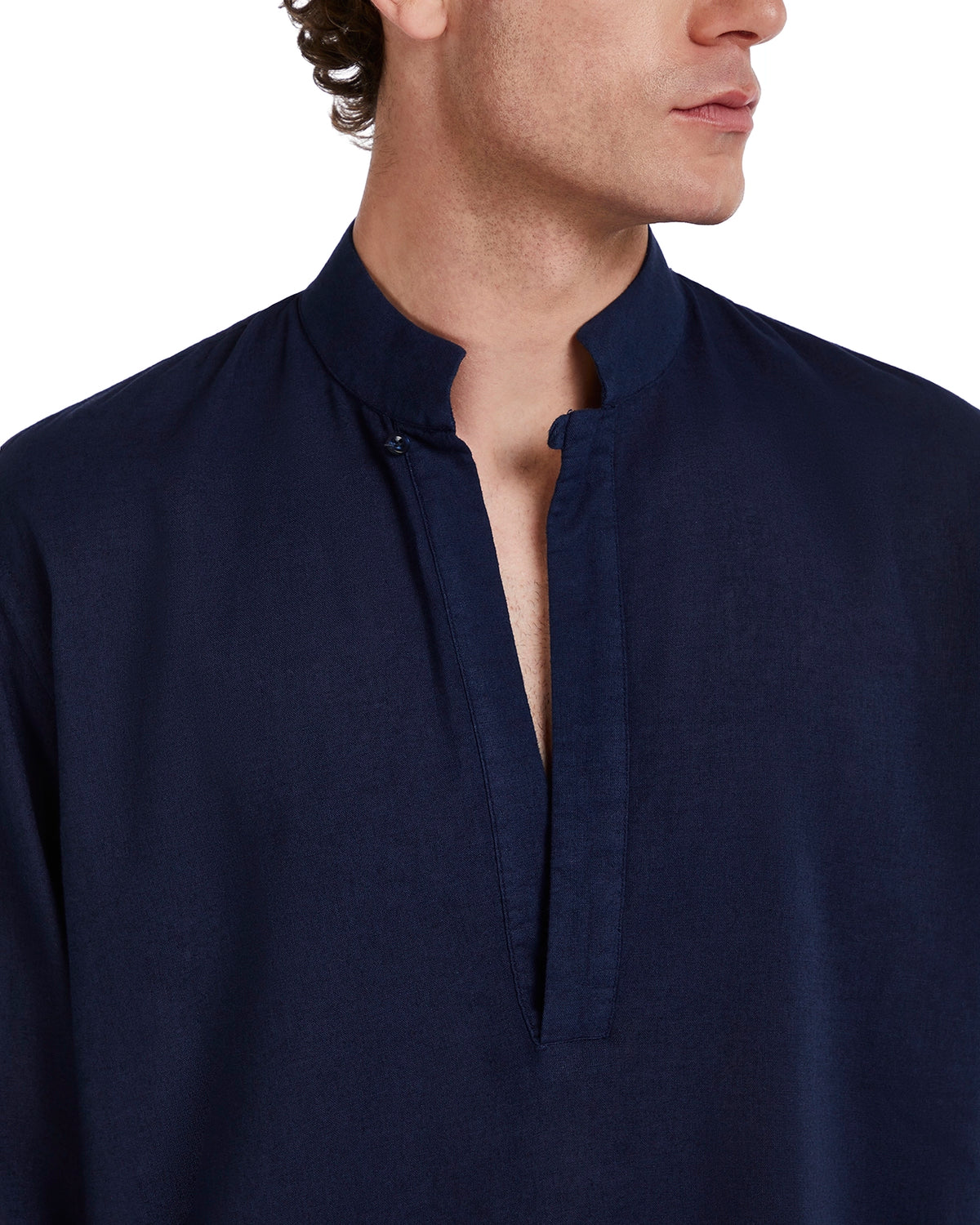 Navy blue linen shirt with a mandarin collar and half-button placket for a relaxed, stylish look.