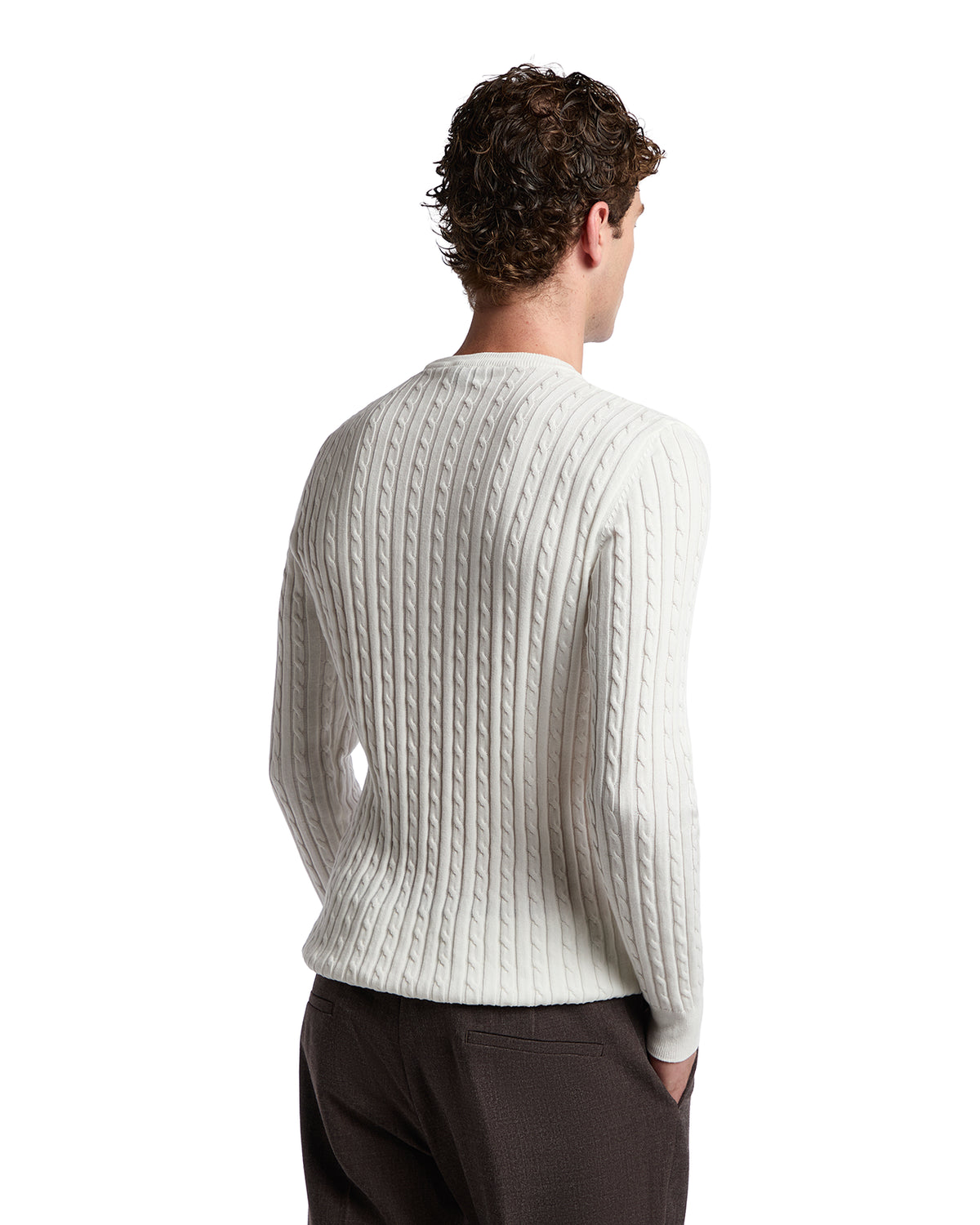 Men's cream cable-knit sweater in soft cotton, featuring a ribbed texture and fitted silhouette, perfect for layering.