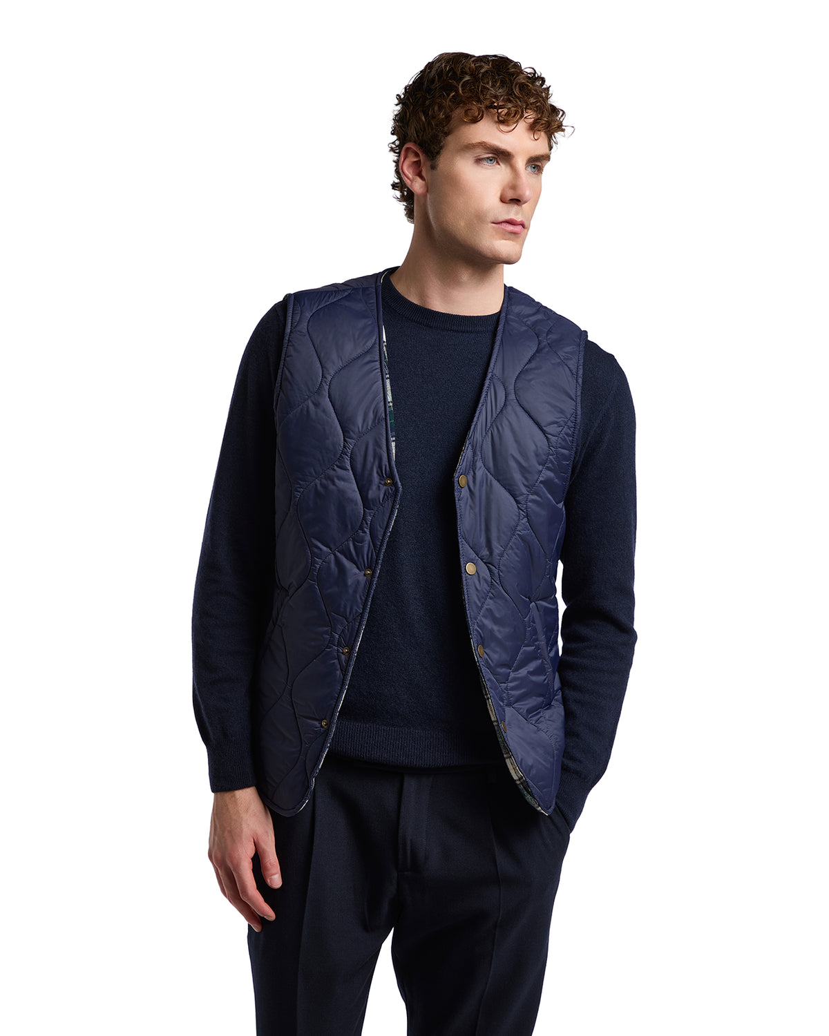 Men's navy quilted vest, lightweight design, perfect for layering. Stylish and versatile for casual or formal looks.