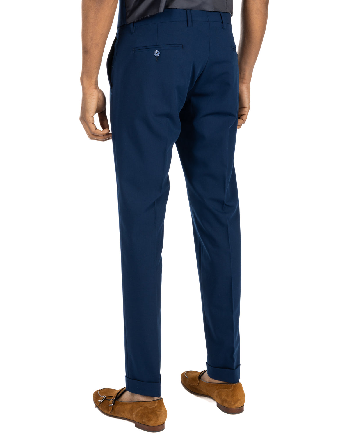 Navy blue slim-fit dress pants with back button pocket, cuffed hem, and tailored silhouette for men