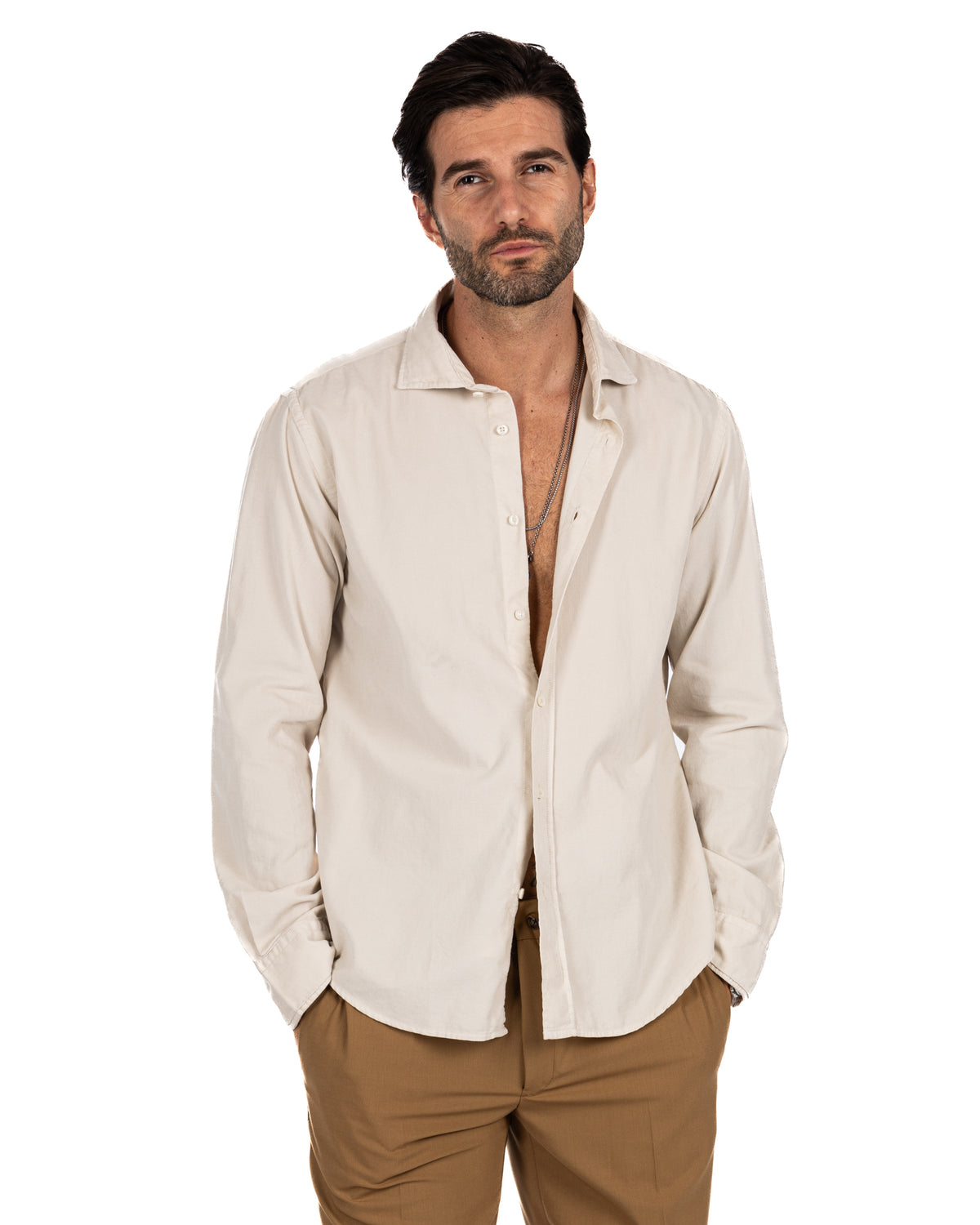 Men's cream corduroy button-down shirt with relaxed fit, long sleeves, and spread collar.