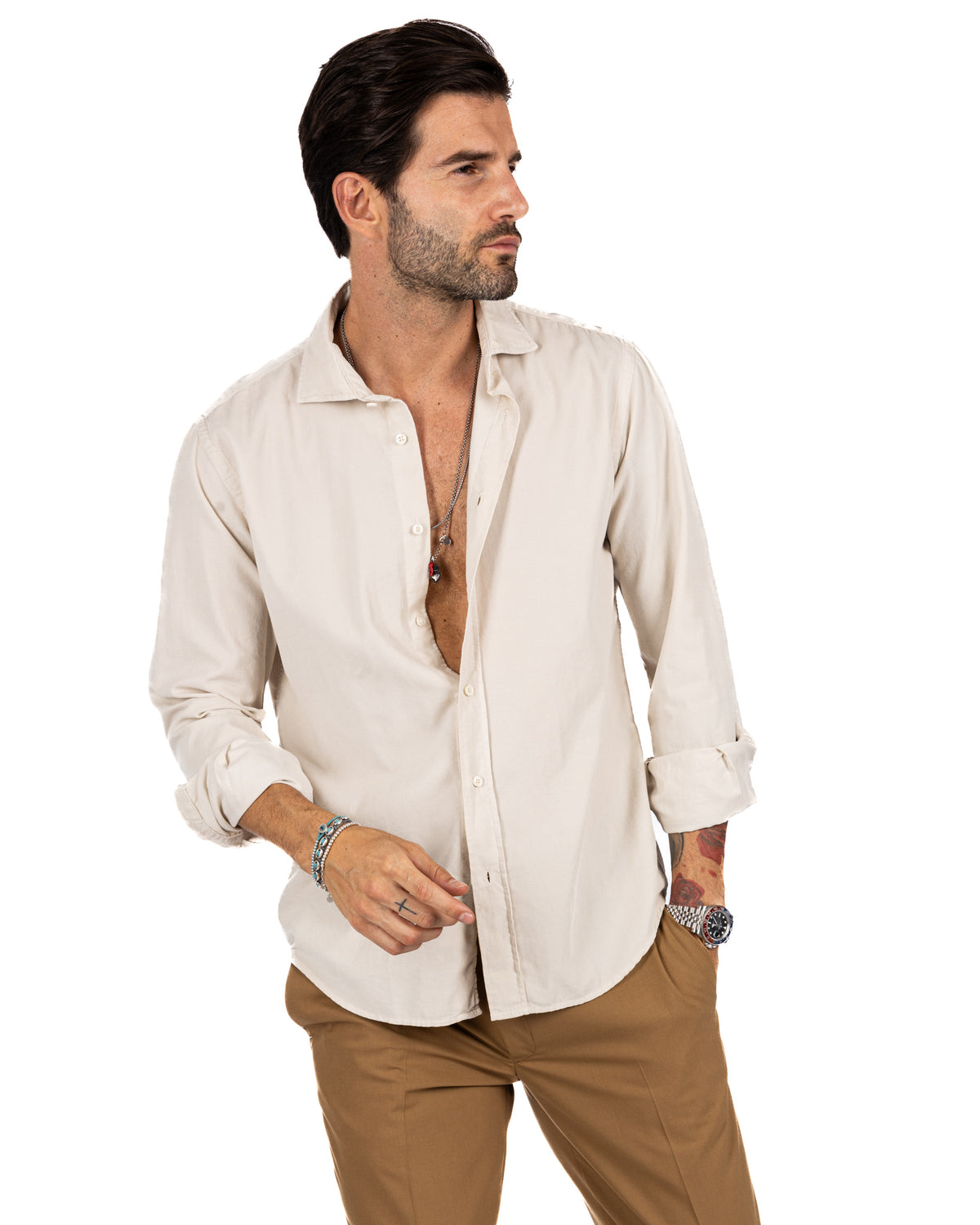 Men's cream linen button-down shirt with relaxed fit, long sleeves, and spread collar. Casual summer style.