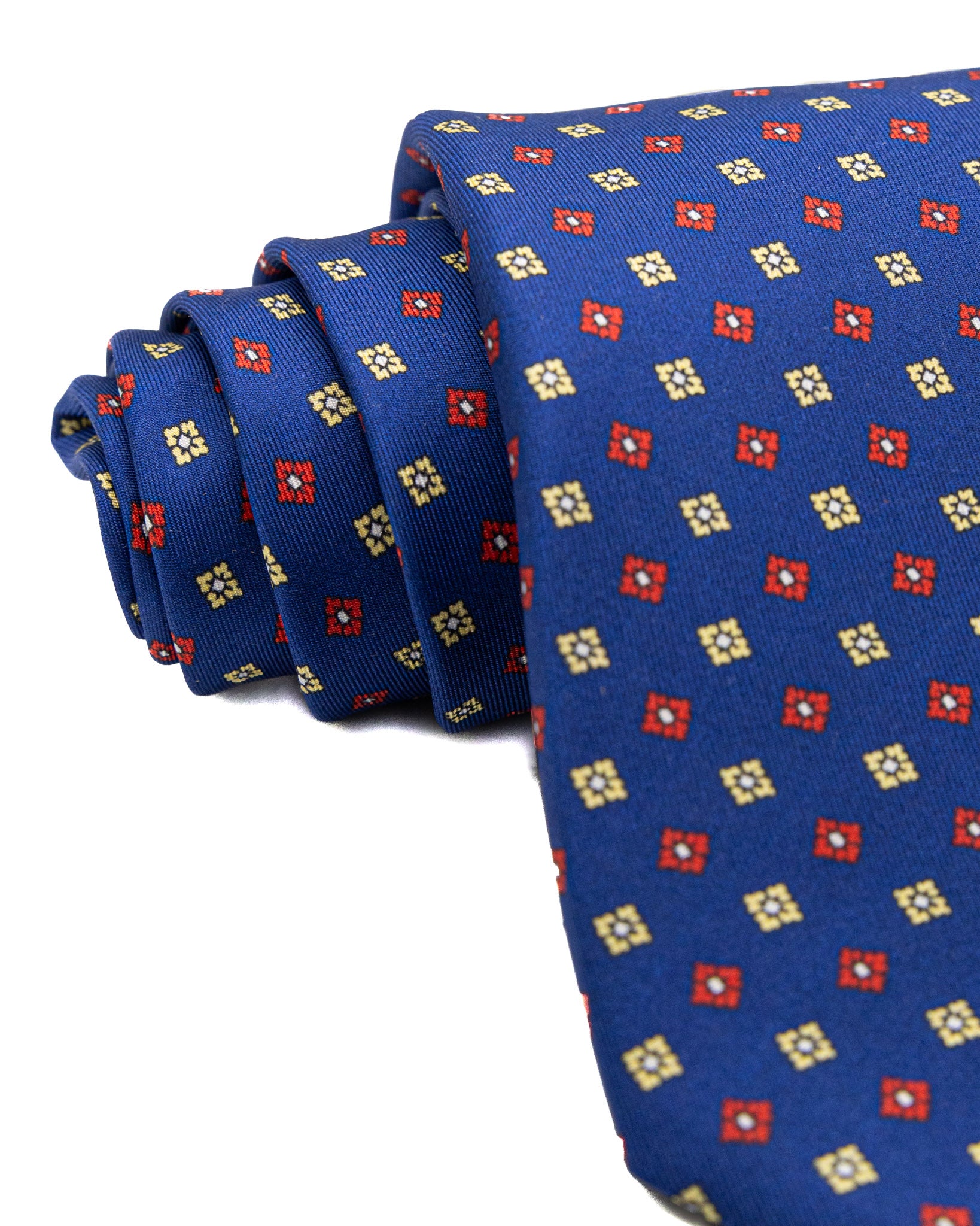 Corbata de seda de siete pliegues azul marino con estampado floral
