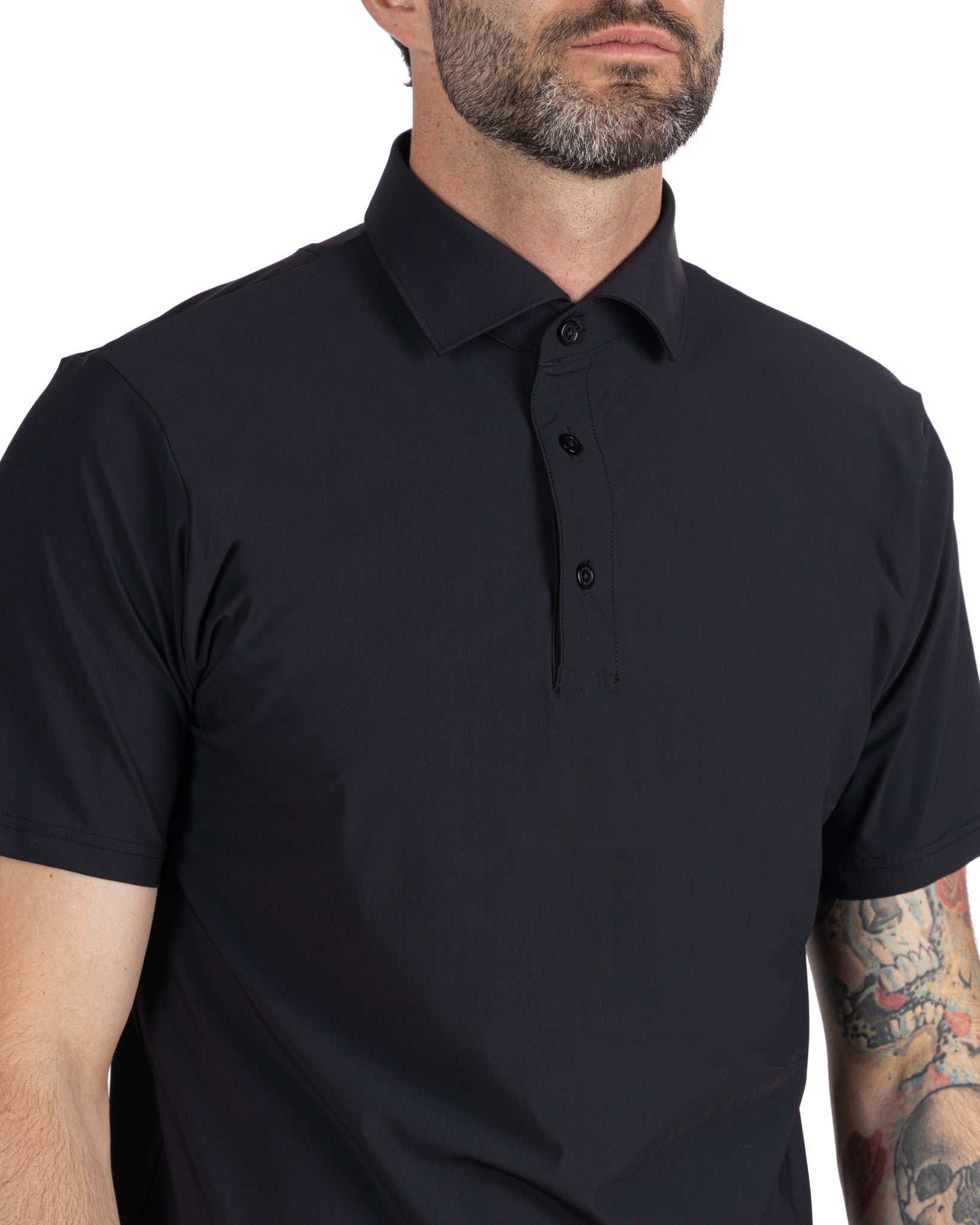 Polo Arnold de tejido de viaje negra