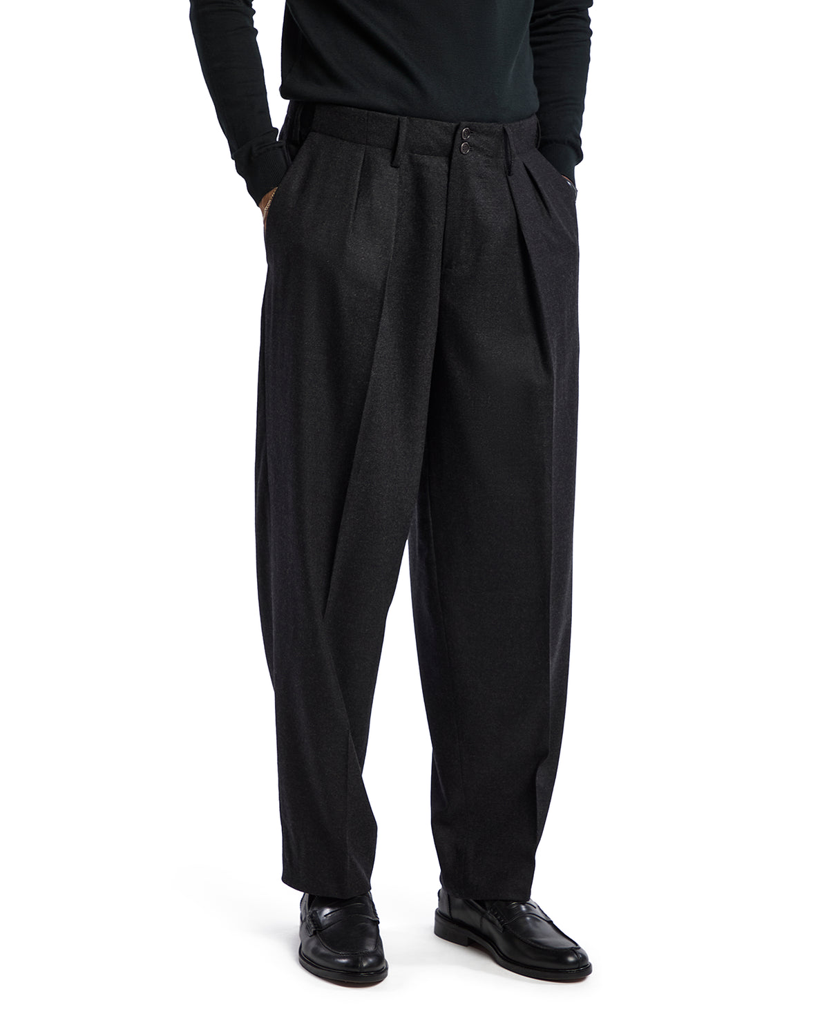 Black pleated wool dress pants with a relaxed fit, perfect for formal or business-casual occasions.