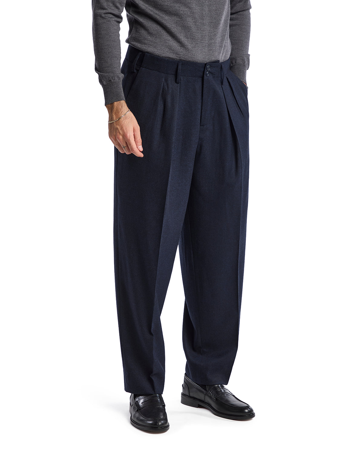 Navy pleated wool trousers for men, featuring a classic fit and stylish, versatile design, perfect for formal occasions.