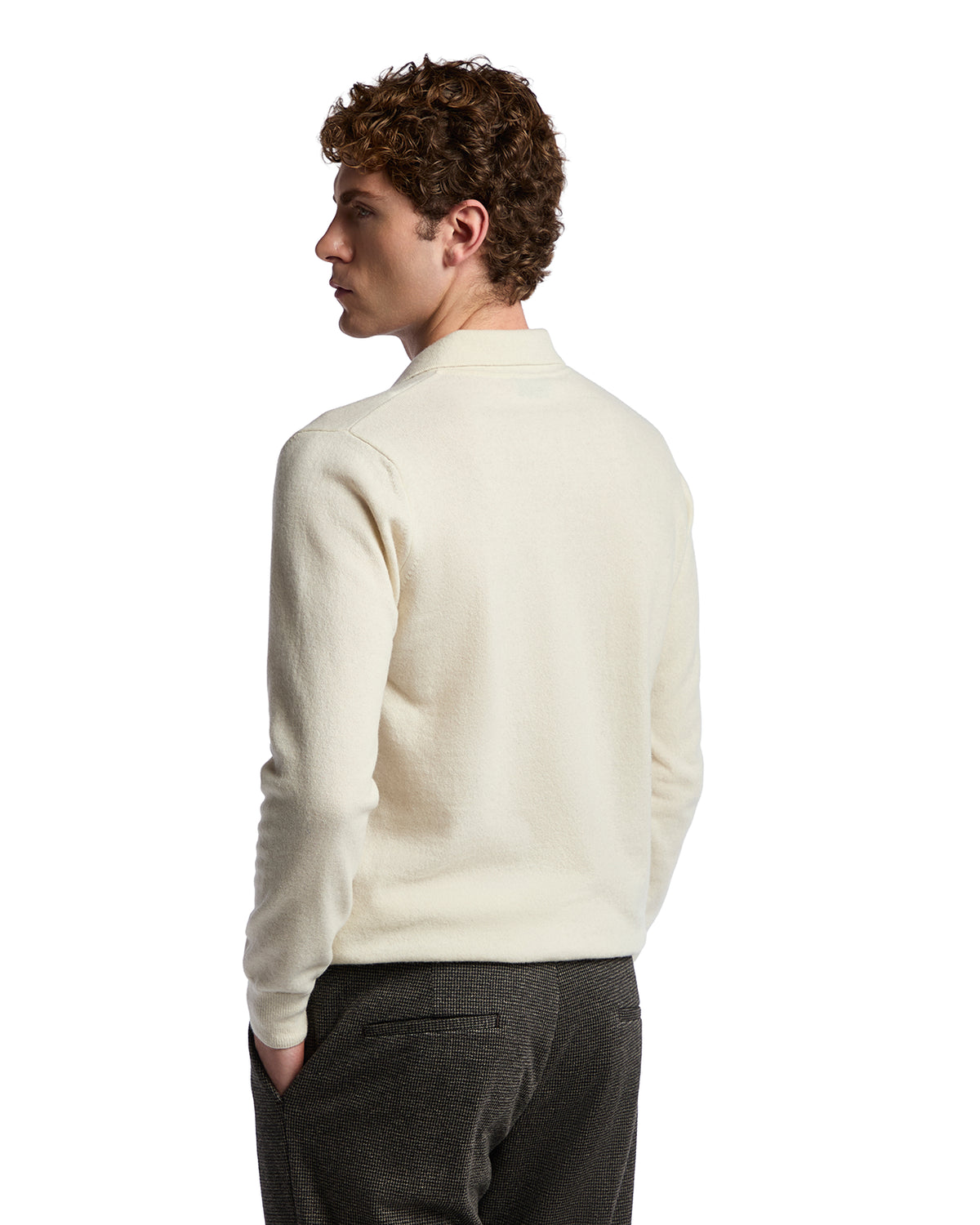 Men's cream cashmere sweater, soft texture, relaxed fit, ideal for casual or semi-formal wear.