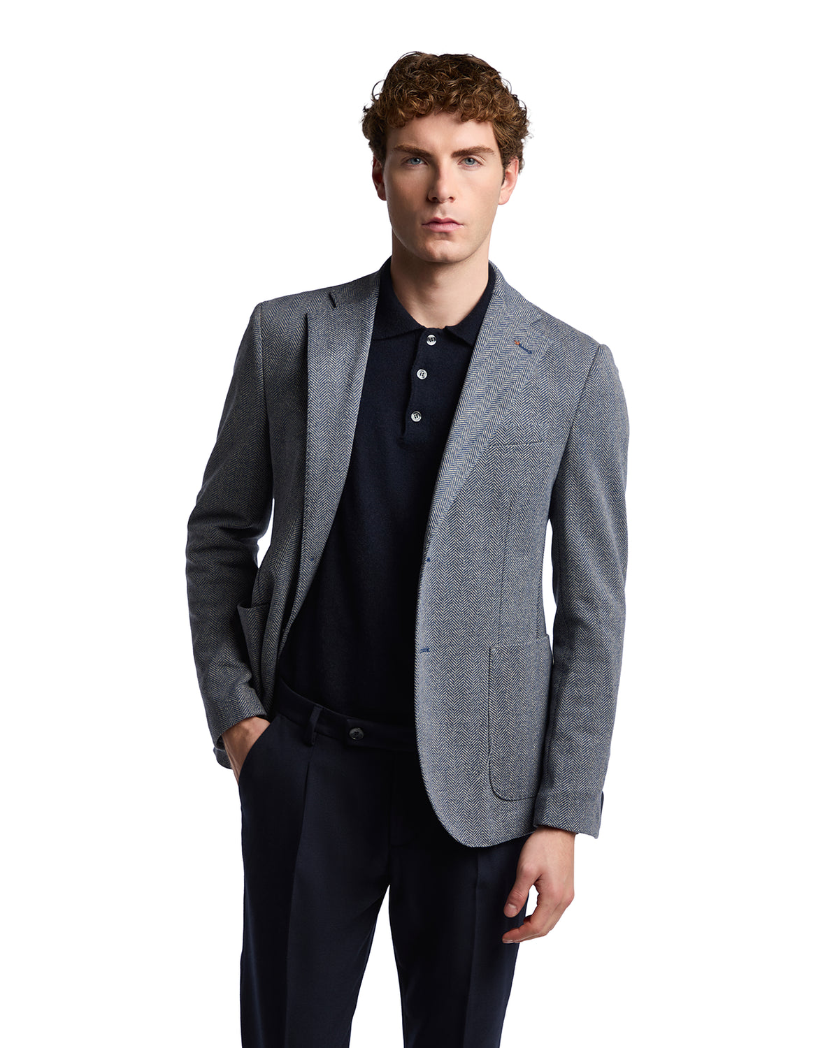 Men's grey textured blazer in wool blend, paired with a navy polo shirt, tailored fit for a sophisticated look.