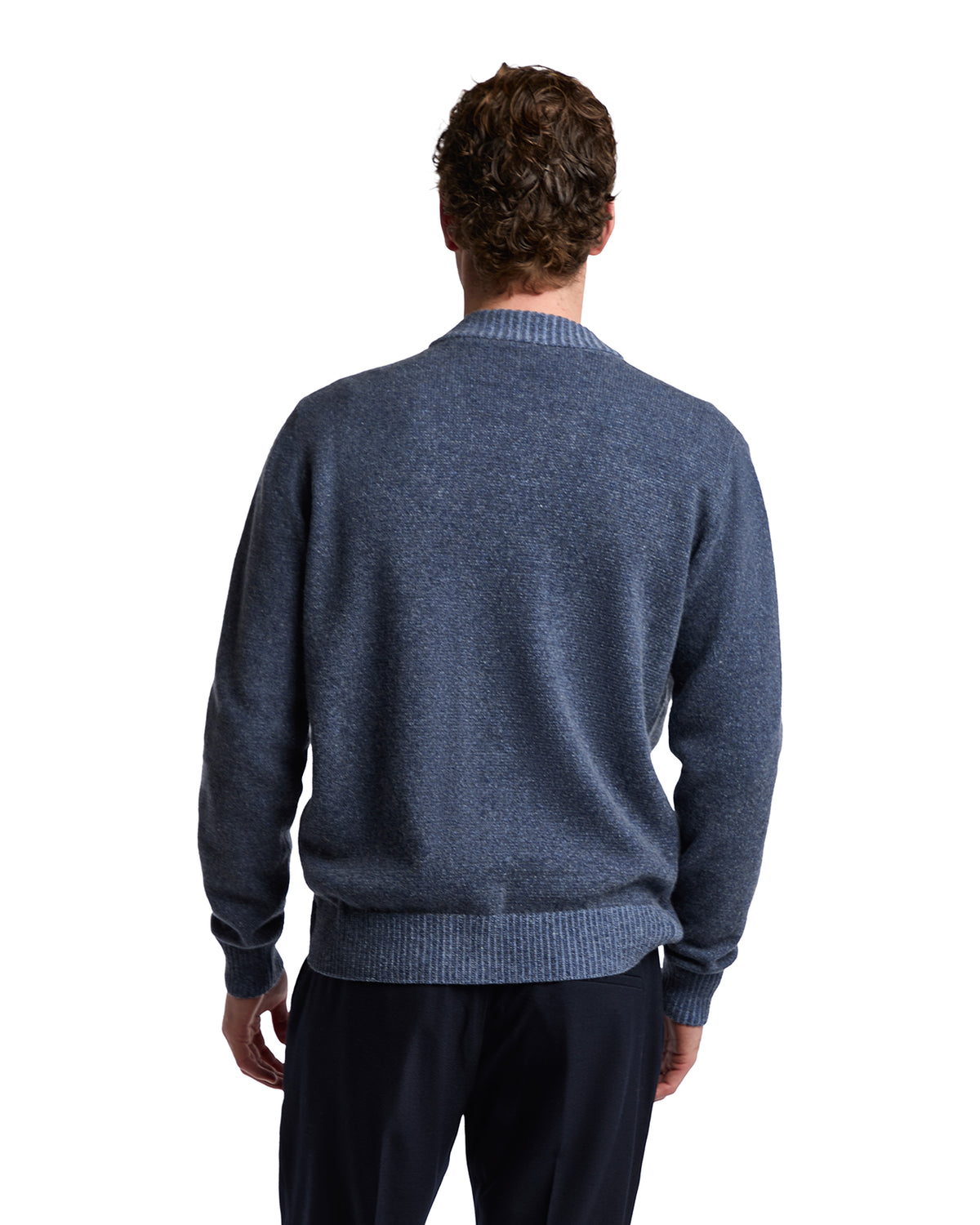 Men's navy blue wool sweater with a classic crew neck and ribbed hem, perfect for casual or smart-casual outfits.