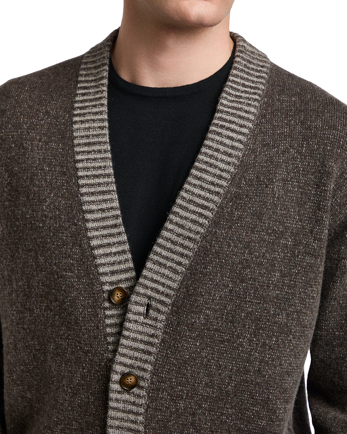 Brown wool cardigan with striped shawl collar and wooden buttons, perfect for a cozy, stylish winter look.