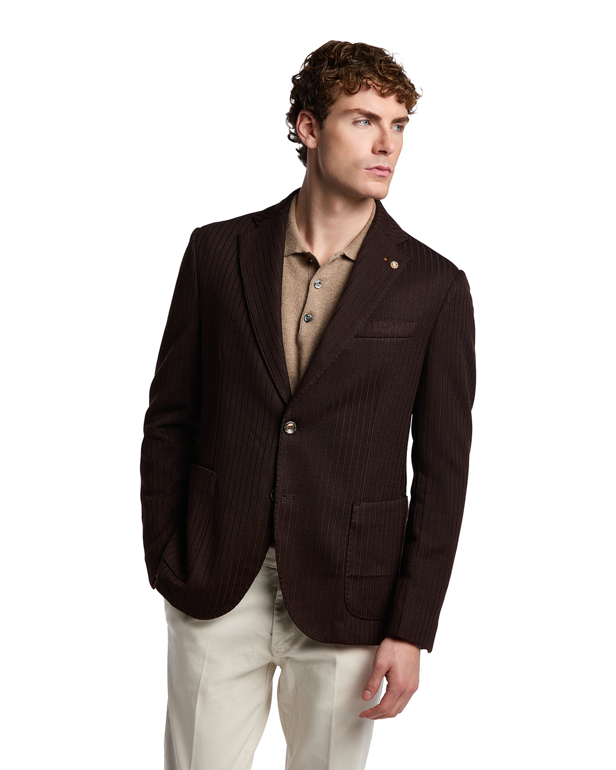 Brown pinstripe blazer in lightweight fabric, paired with a beige polo and cream trousers for a smart-casual look.