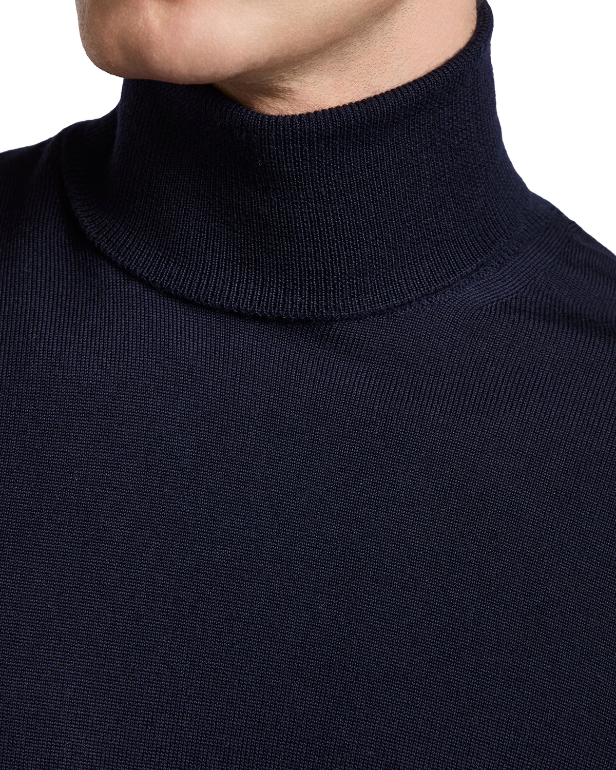 Men's navy turtleneck sweater made of soft, stretchy fabric for a comfortable, stylish look.