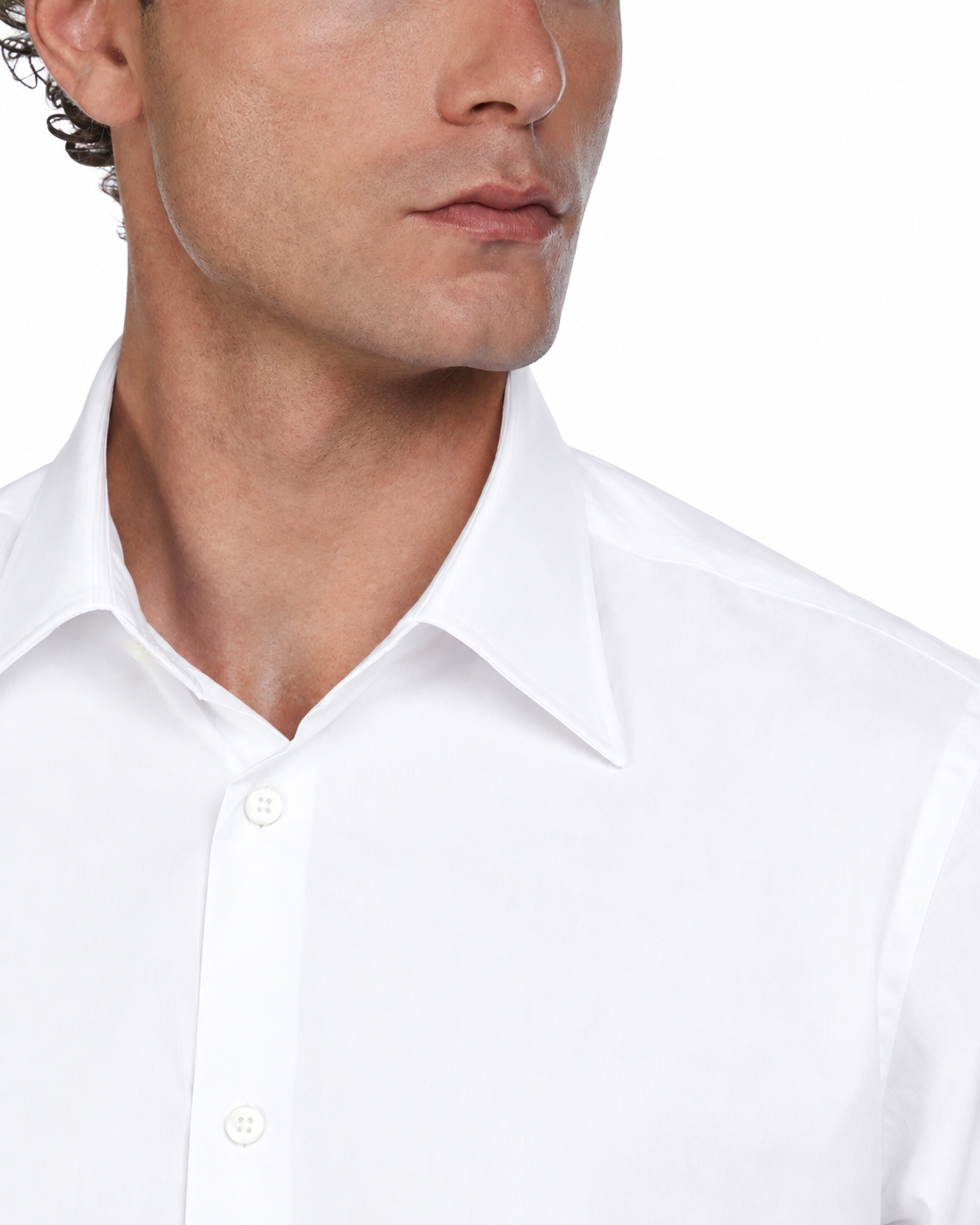 White cotton dress shirt for men with a classic collar and button closure, perfect for formal occasions.