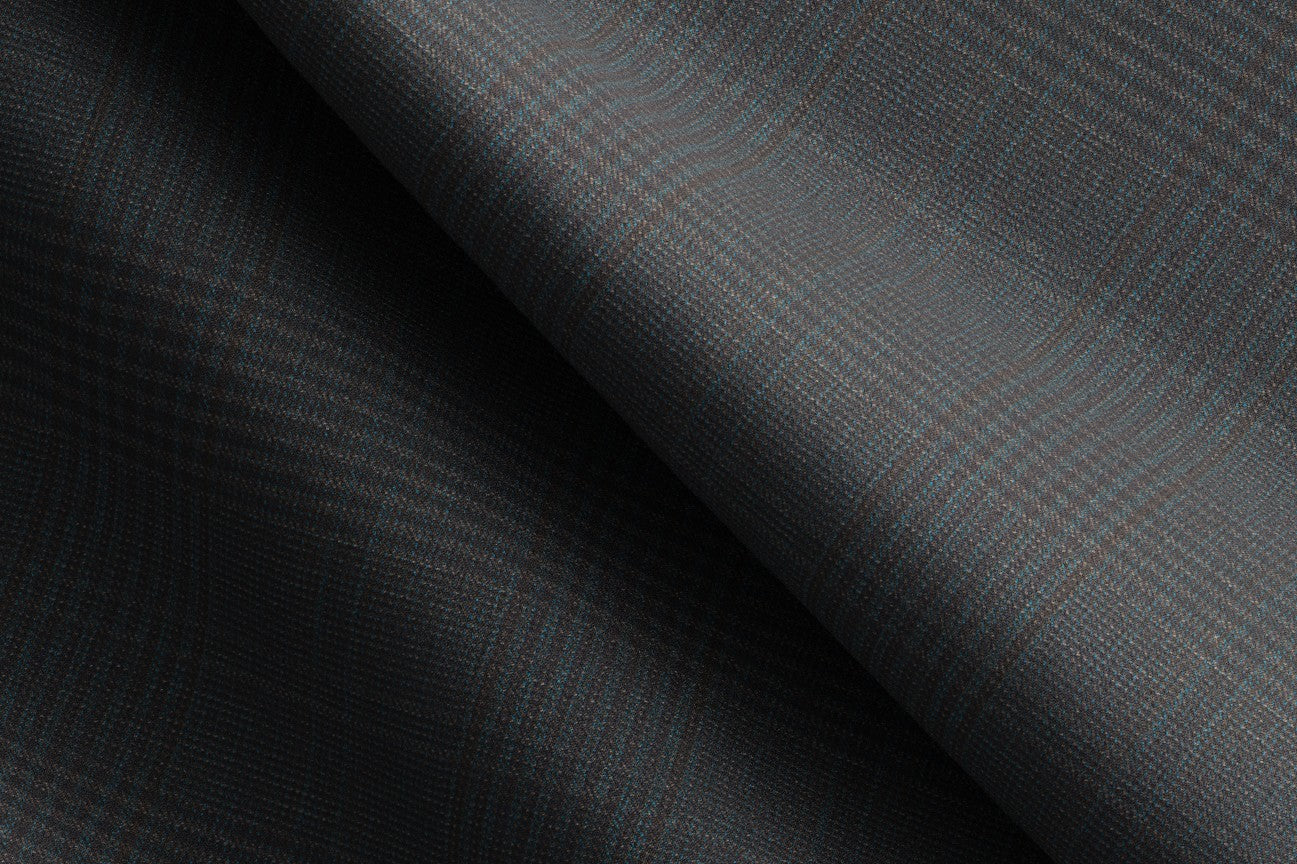 Trousers with tailored band in 130s green Prince of Wales wool Caccioppoli