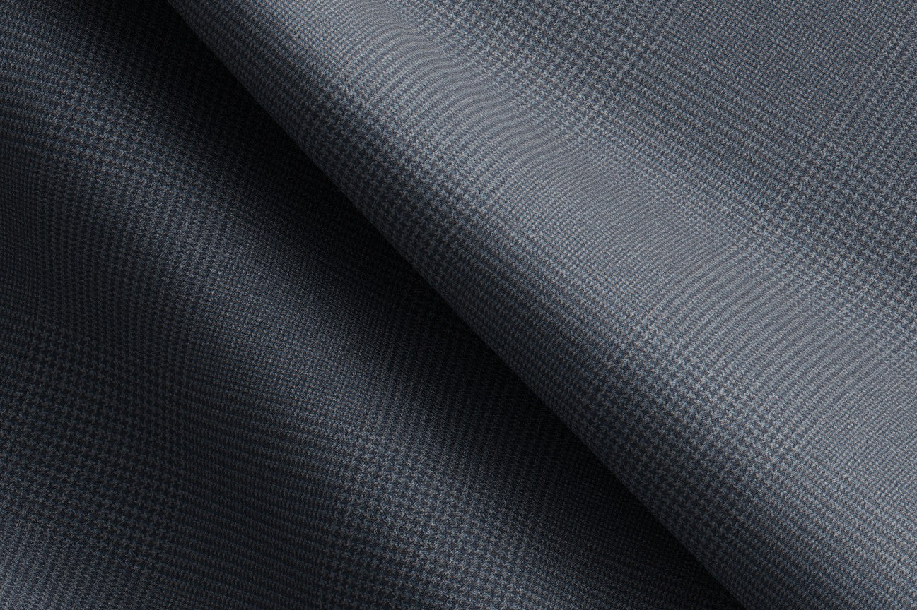Made to measure suit in 150s green wool and silk Caccioppoli