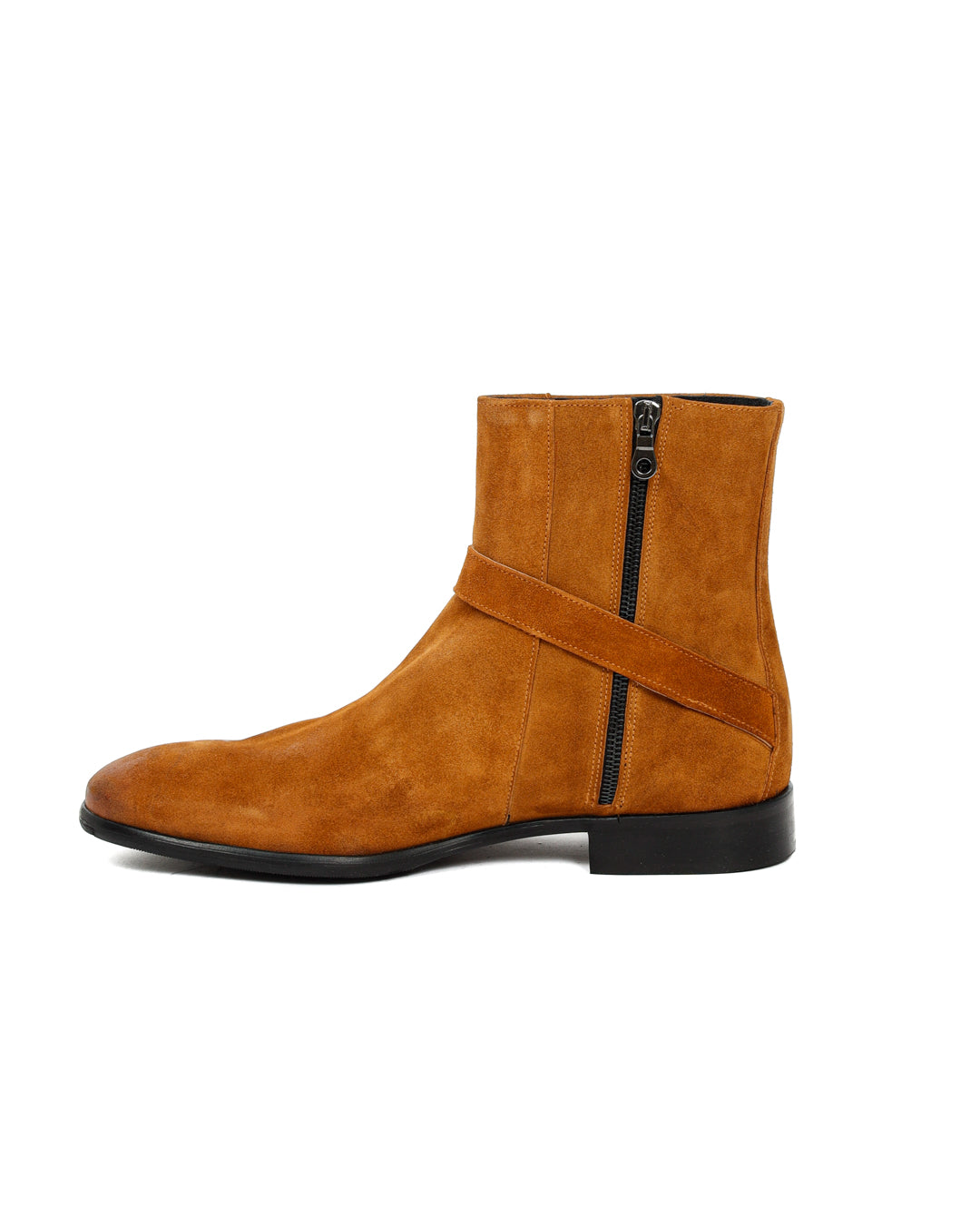 Tan suede ankle boot with diagonal buckle strap and inner zipper, shown in side profile