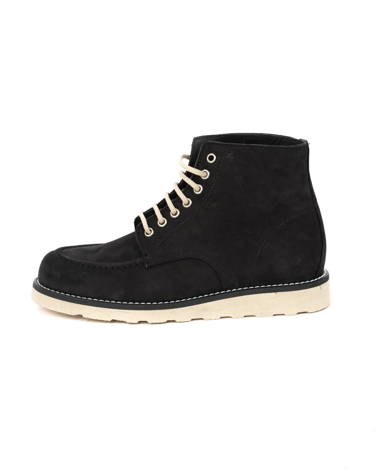 Black suede lace-up ankle boot with cream sole and off-white laces, featuring moc toe and contrast stitching detail.