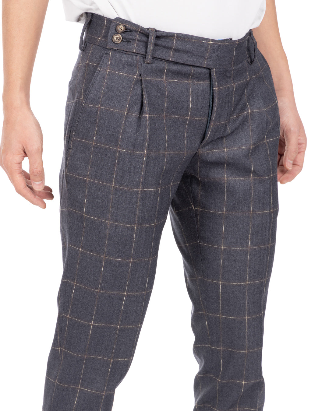 Close-up detail of the waistband on men's blue-gray windowpane check wool trousers with double buttons and pleats