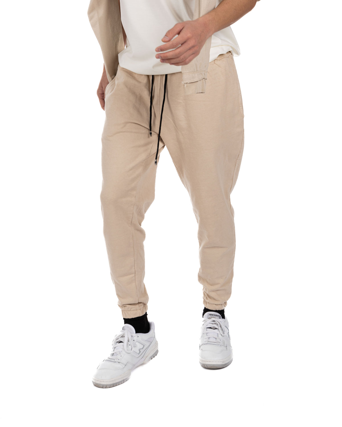 Men's black cotton drawstring jogger pants with tapered leg and elastic ankle cuffs, front view