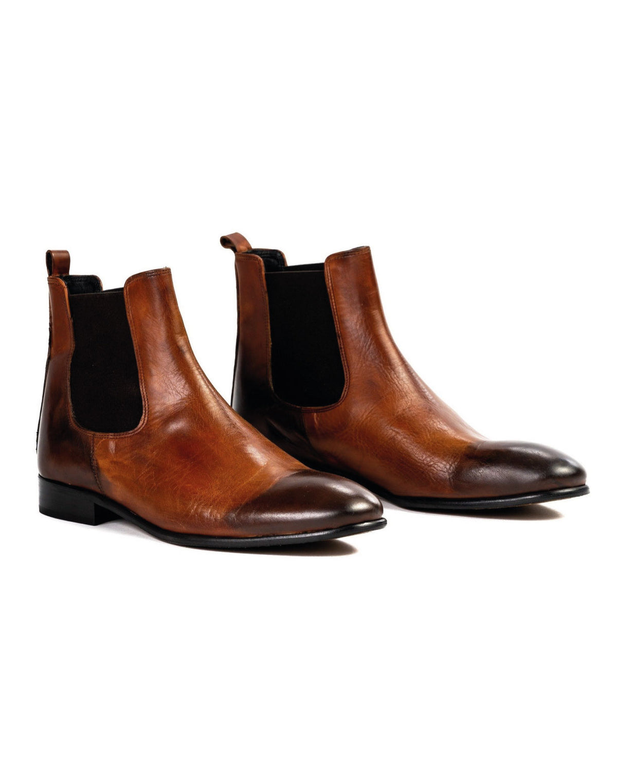Brown leather Chelsea boots with black elastic side panels and sleek pointed toes, perfect for formal and casual wear.