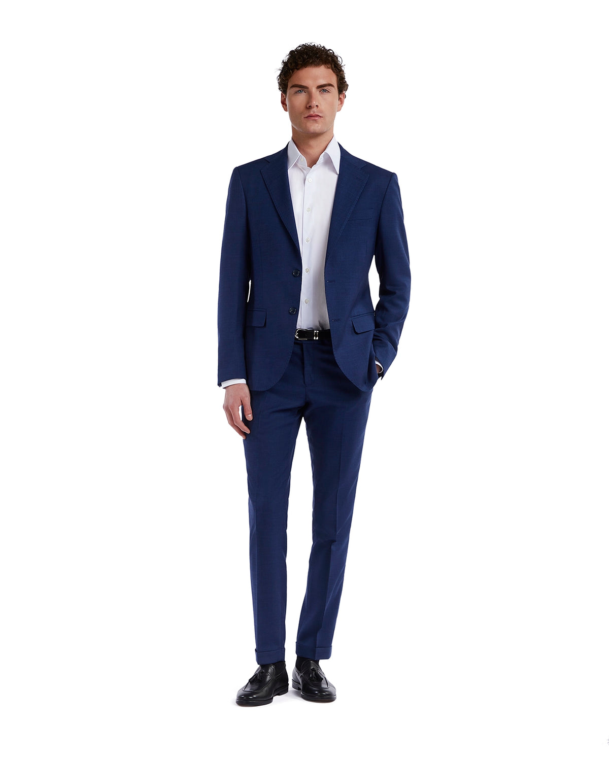 Men's tailored blue suit made of wool, featuring a slim fit, double-button jacket, and white dress shirt.