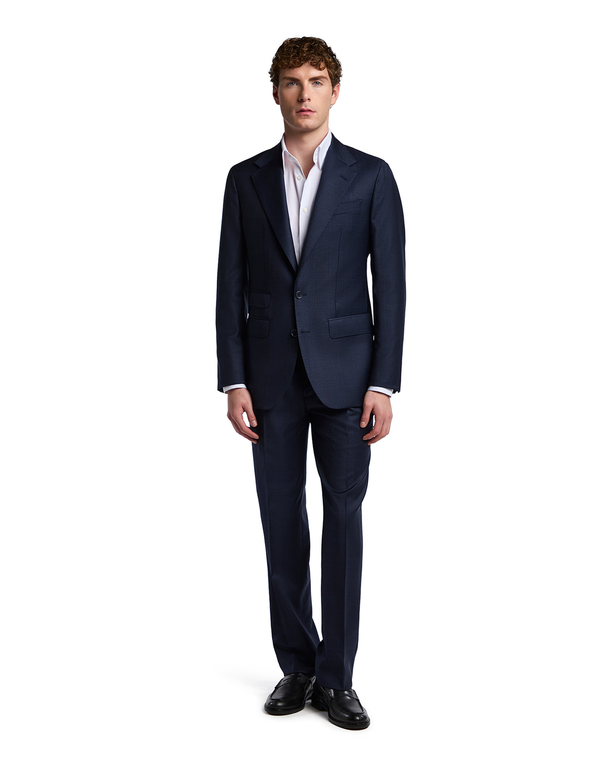 Men's tailored navy suit in wool-blend fabric, featuring a sleek design, single-breasted jacket, and slim-fit trousers.
