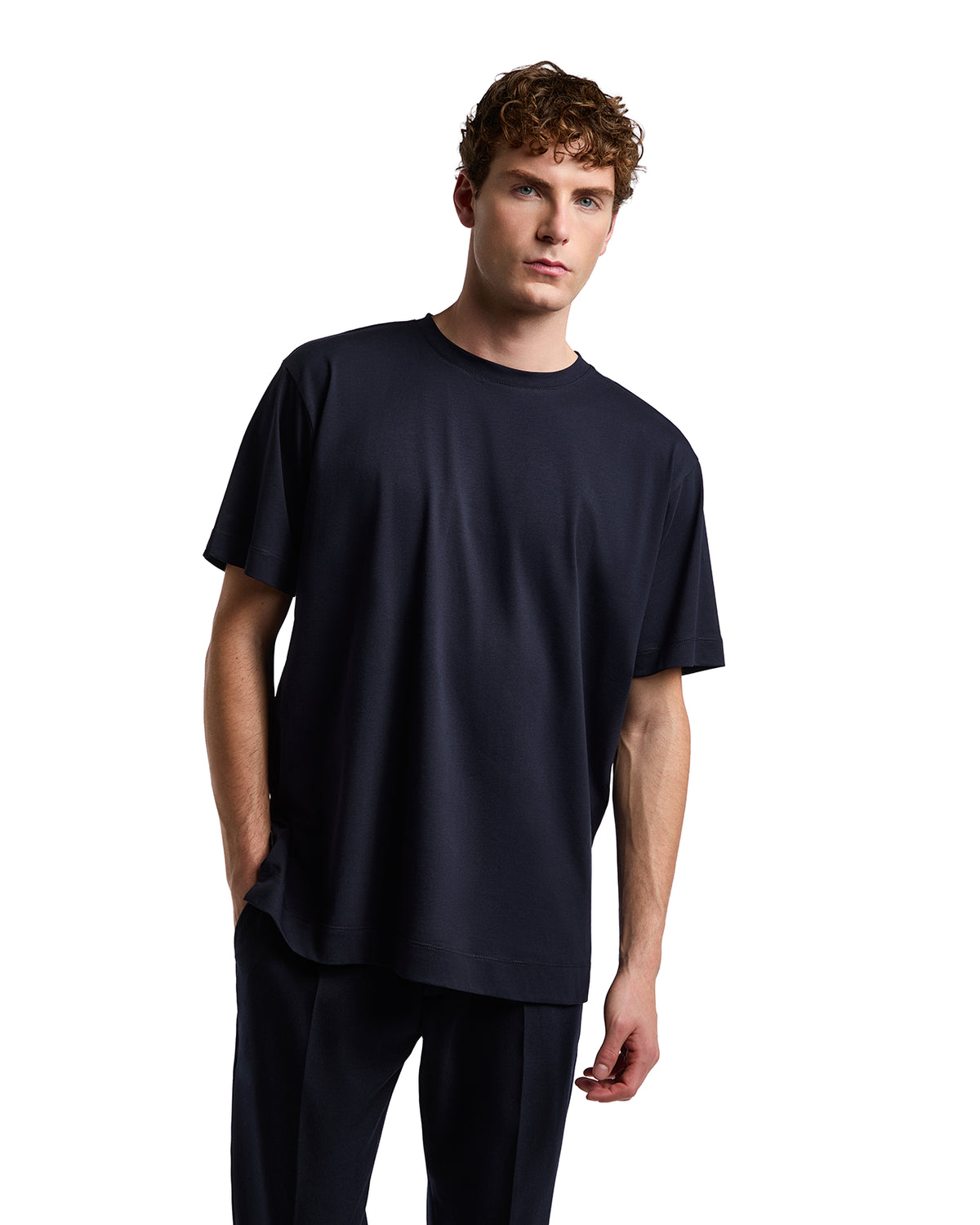 Navy blue oversized t-shirt made from soft cotton, featuring a relaxed fit and crew neckline. Perfect for casual wear.
