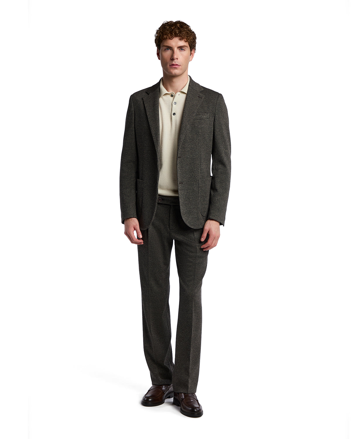 Men's brown tweed suit with light beige polo, modern fit, ideal for smart casual or business attire.