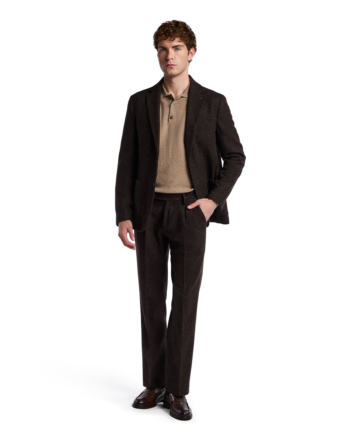 Brown wool blend suit with a tailored fit, paired with a beige polo shirt and dark shoes. Perfect for smart casual occasions.