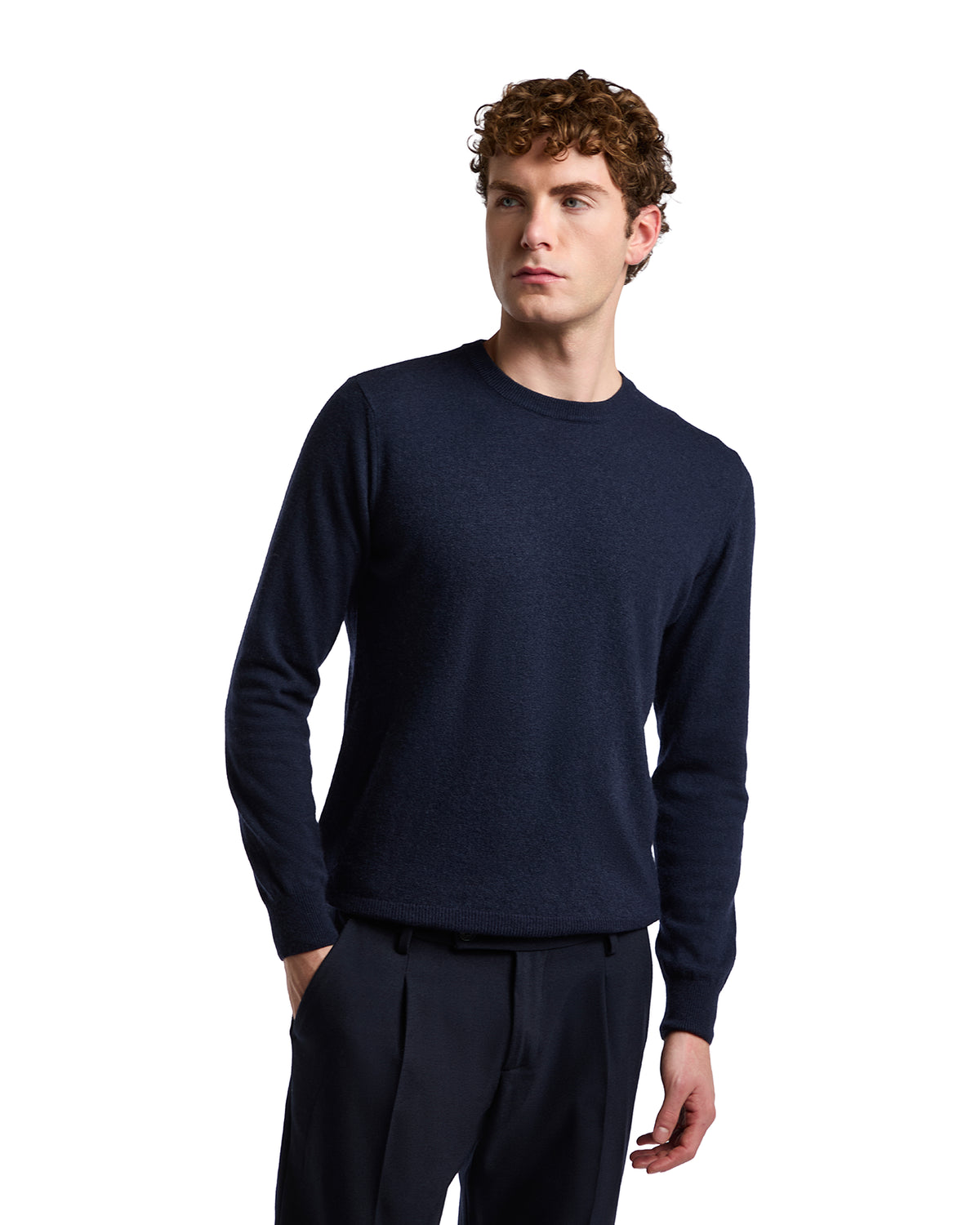 Navy crewneck sweater in soft fabric, perfect for casual or business-casual outfits. Ideal for layering.