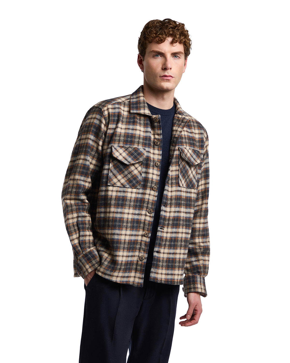 Brown and beige plaid flannel jacket with two chest pockets, perfect for casual layering in cooler weather.