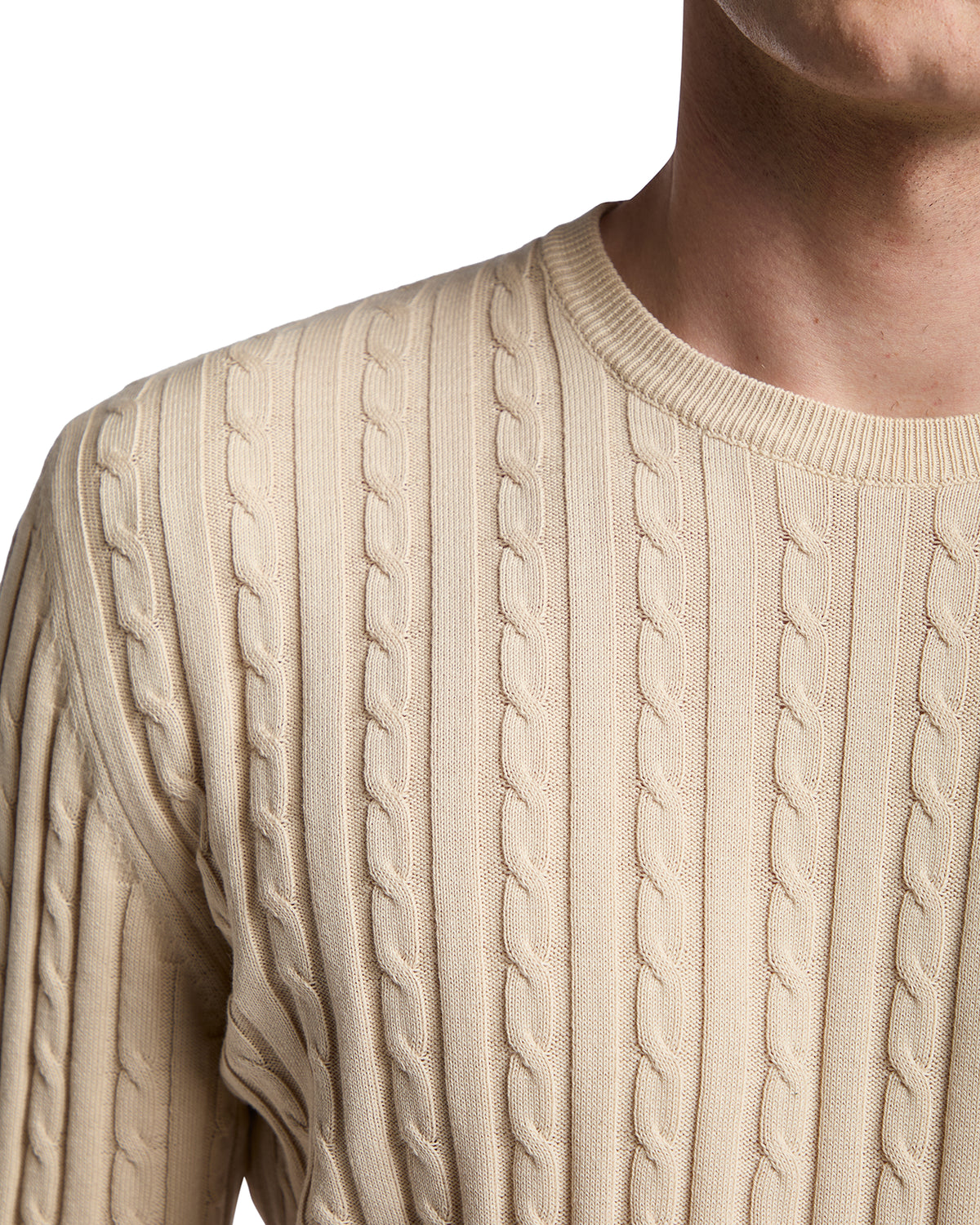 Beige cable-knit sweater for men, featuring a classic ribbed round neckline and cozy texture. Perfect for casual wear.
