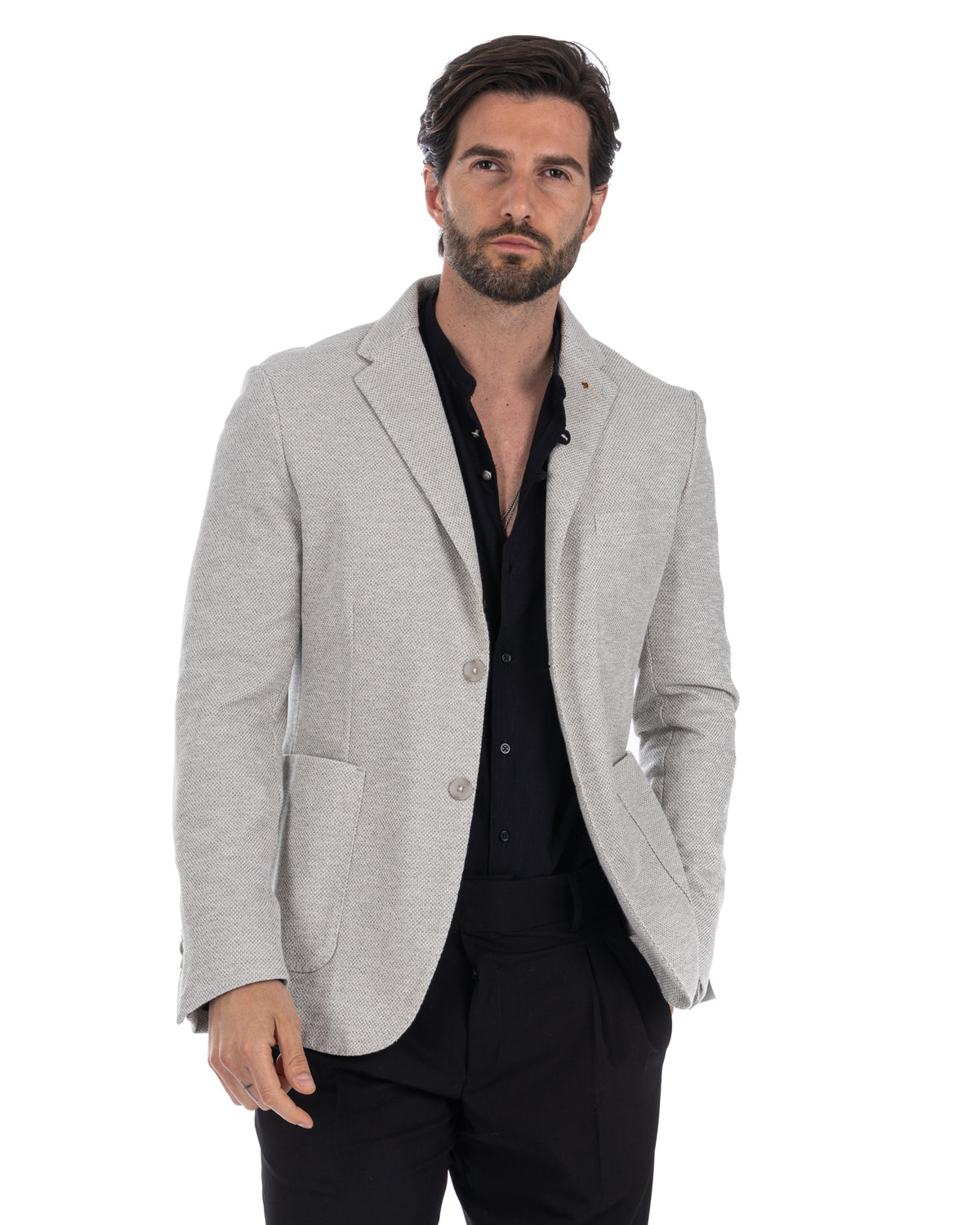 Light gray textured wool blend blazer with notched lapels, paired with black shirt and trousers.