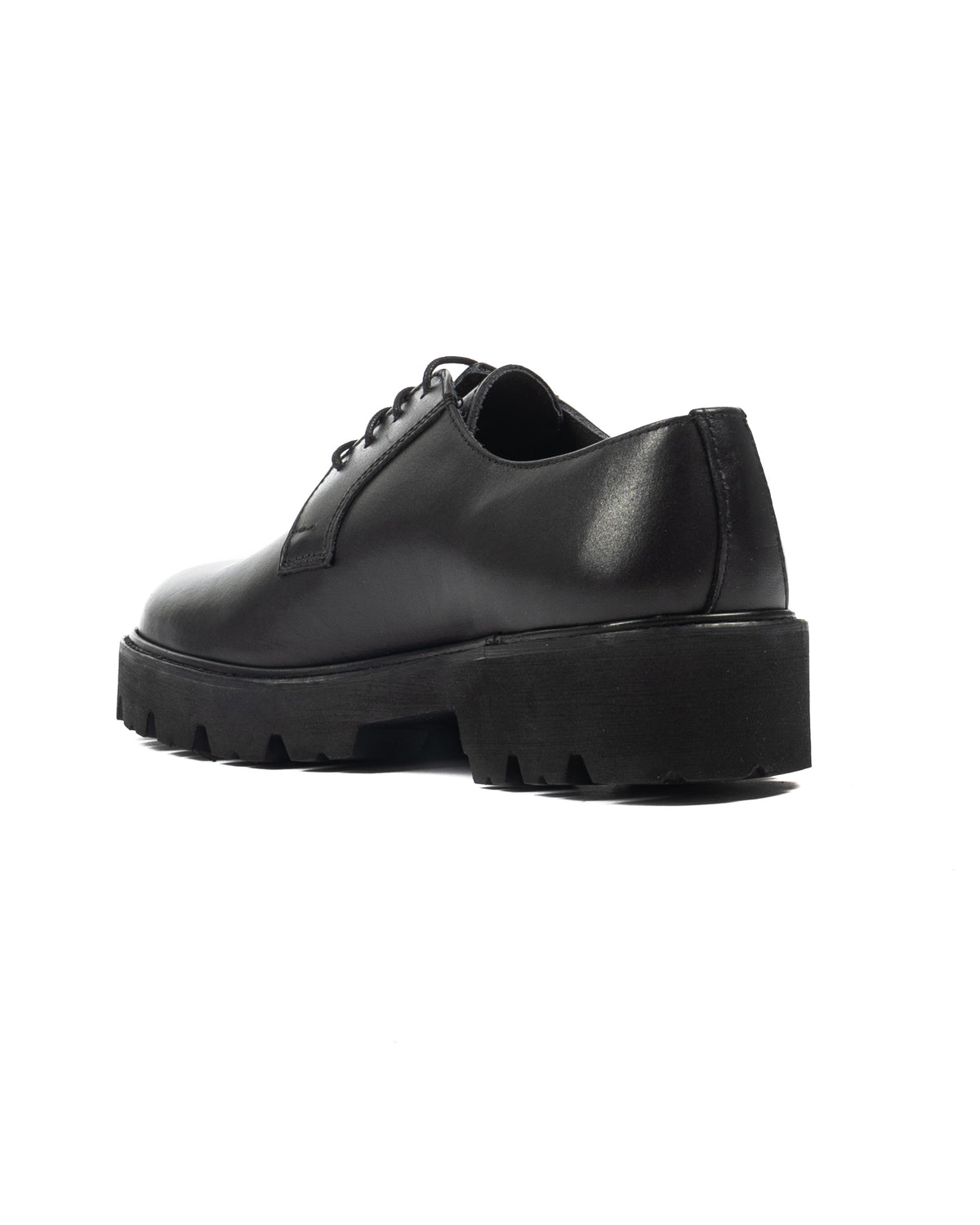 Black leather lace-up platform oxford shoe with chunky lug sole, side profile view on white background.