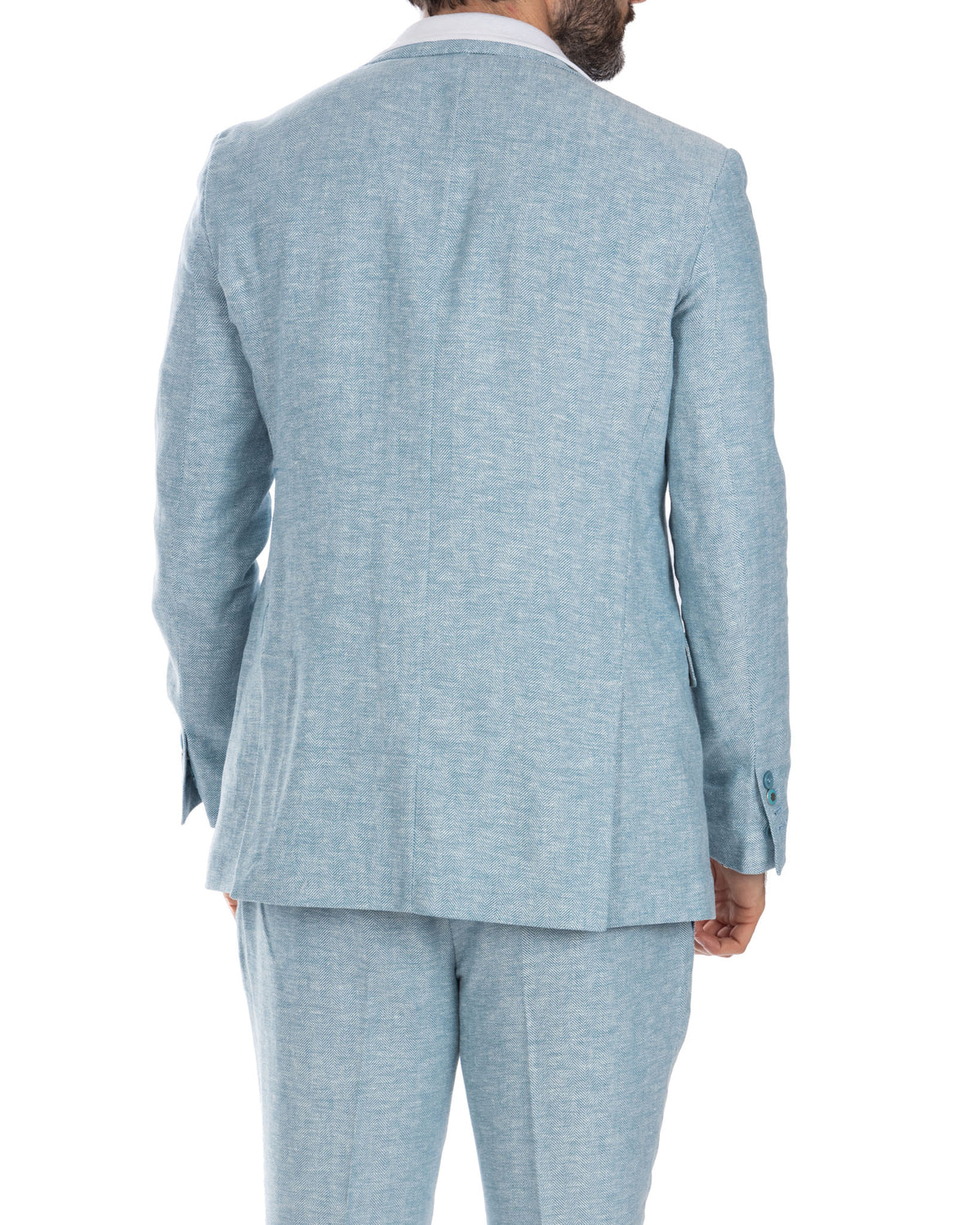 Light blue herringbone linen suit, slim fit, back view. Tailored blazer and matching trousers, summer wedding attire.