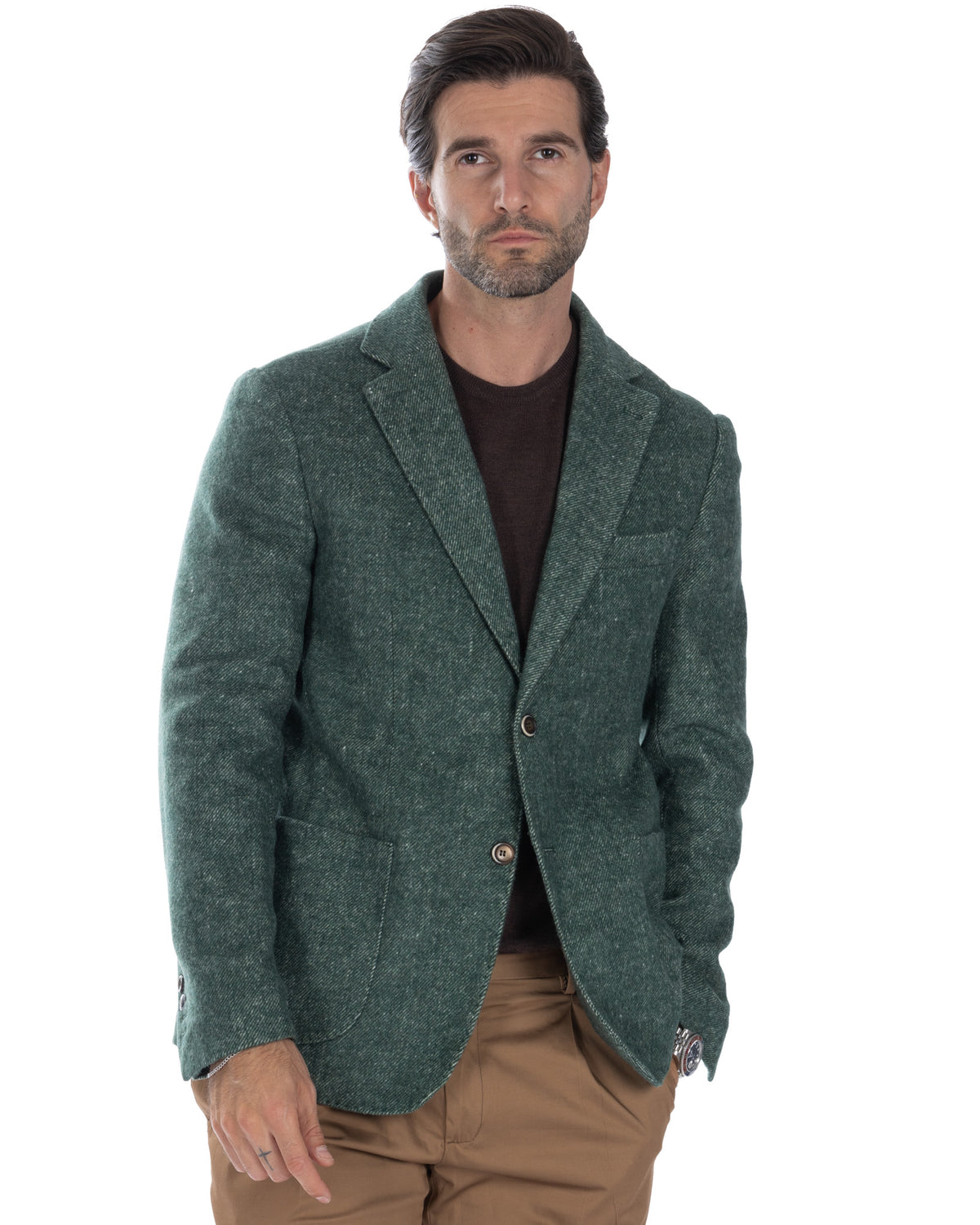 Green wool tweed blazer for men, single-breasted with notched lapels, paired with brown sweater and tan trousers.