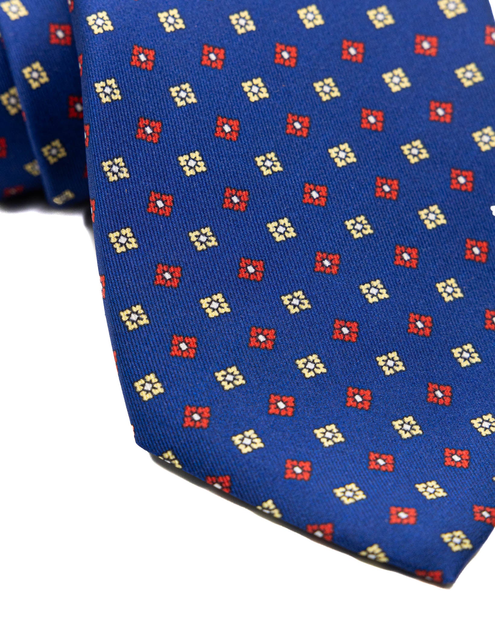 Corbata de seda de siete pliegues azul marino con estampado floral