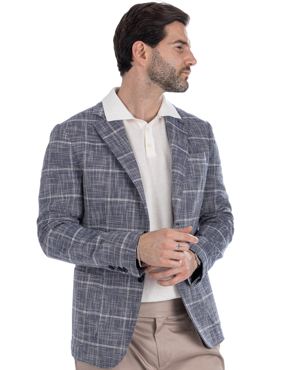 Men's blue plaid linen blazer with white knit polo shirt, smart casual summer suit jacket outfit.