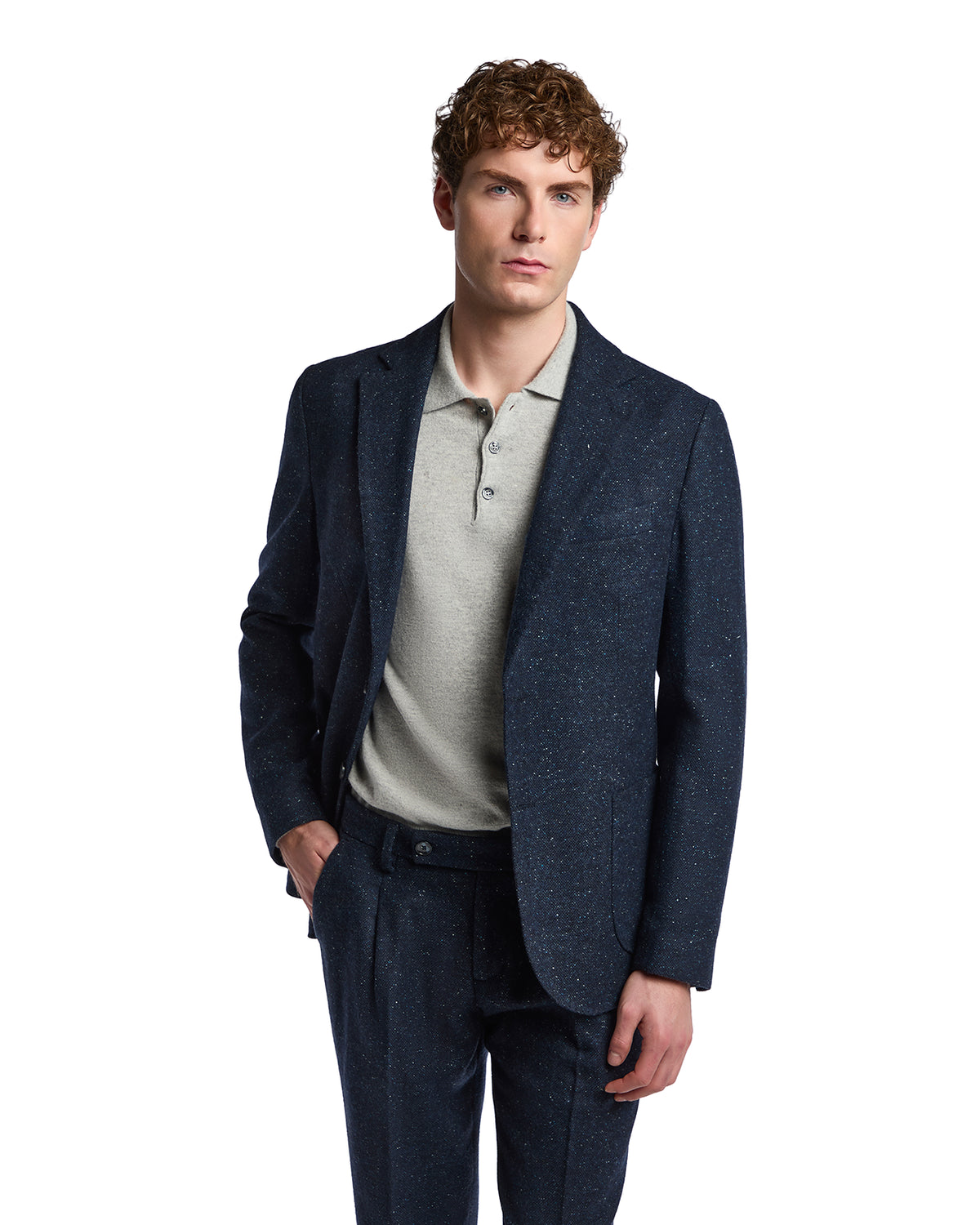 Navy speckled wool blazer paired with a light gray polo, featuring a modern, tailored fit for smart-casual style.