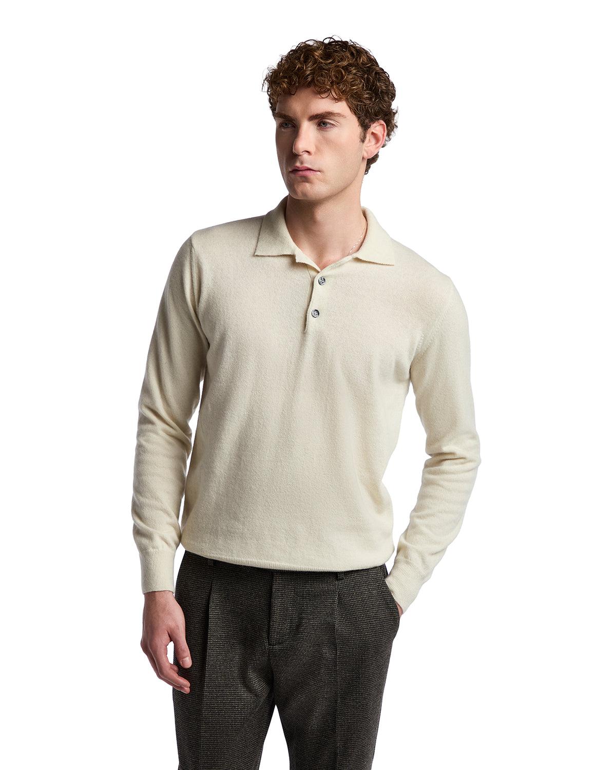 Cream-colored men's long-sleeve polo shirt in soft fabric with three-button placket and stylish collar.