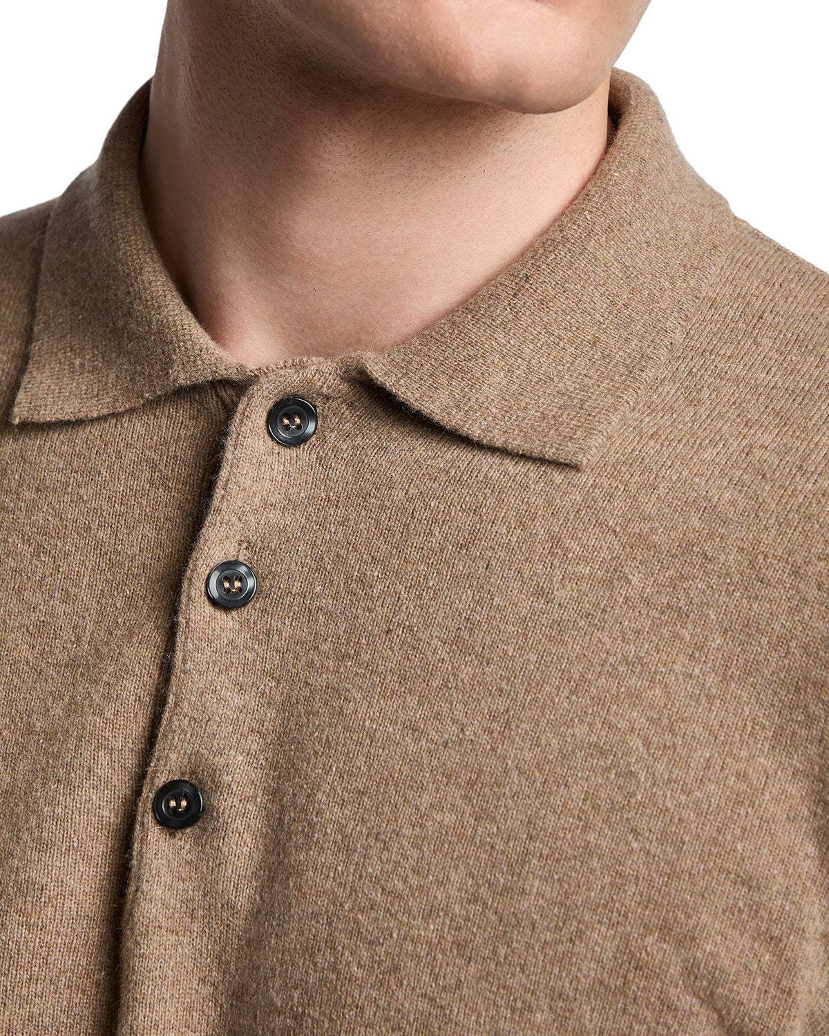 Men's brown knitted polo shirt with a collar and three-button placket, made from soft, premium fabric.