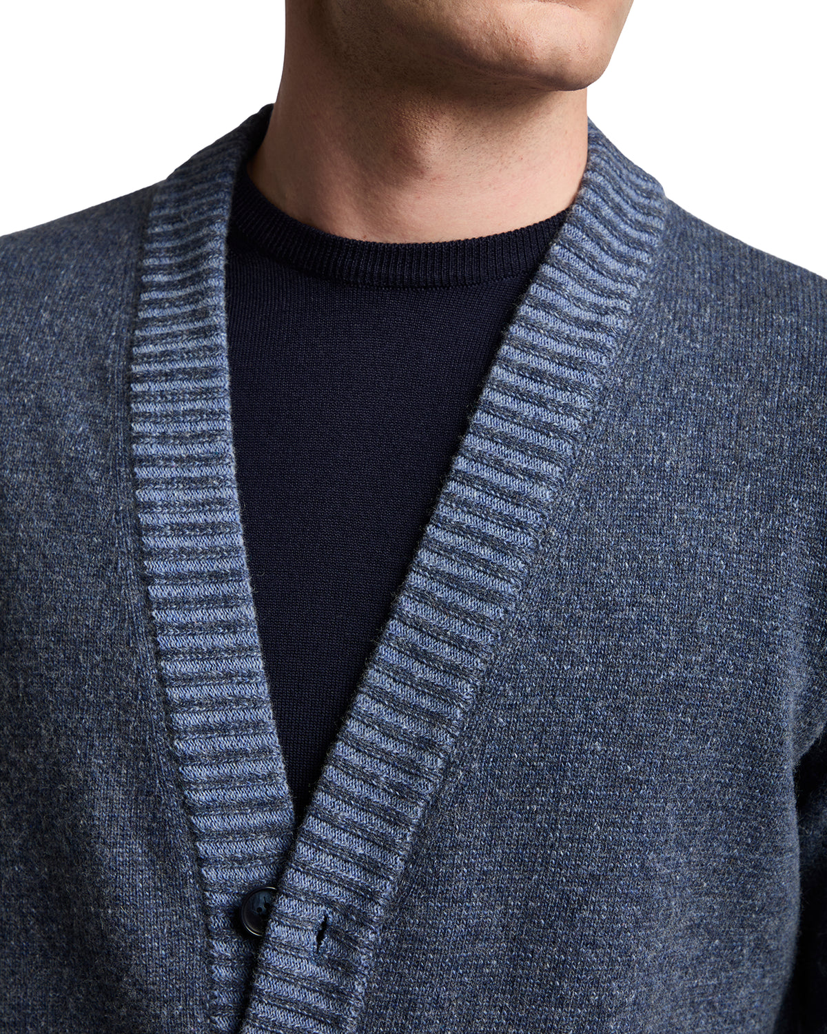 Men's blue wool cardigan with ribbed collar and button detail, perfect for layering in casual or smart outfits.