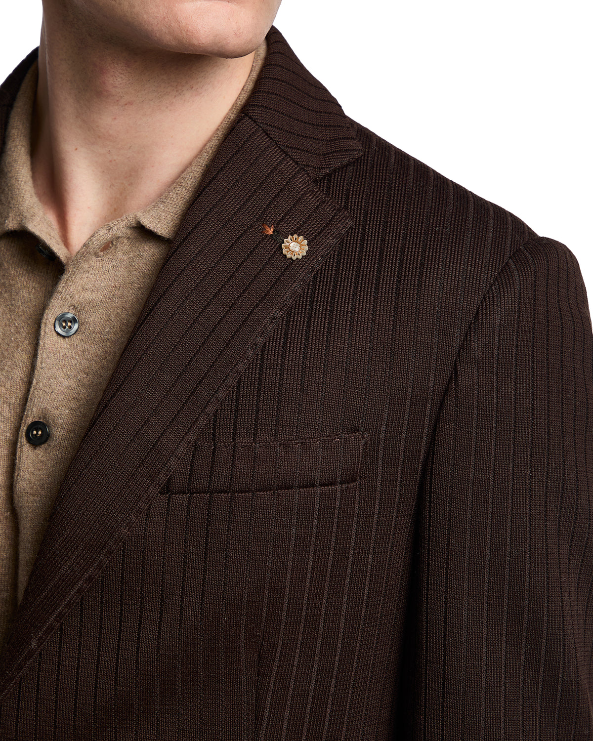 Men's brown pinstripe blazer, tailored fit, featuring a floral lapel pin and textured fabric. Perfect for smart-casual looks.
